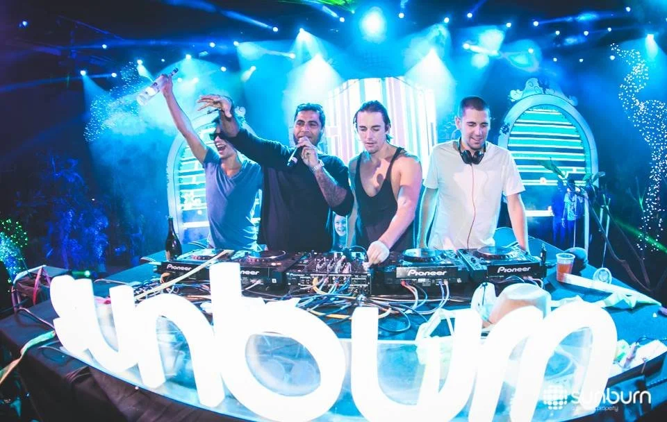 Shailendra-Singh-with-Dimitri-Vegas-and-Like-Mike-on-stage-at-Sunburn.jpg