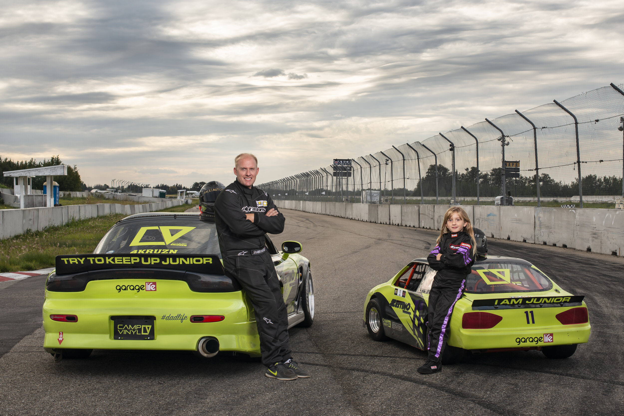 Shawn and Emily back of cars.jpg