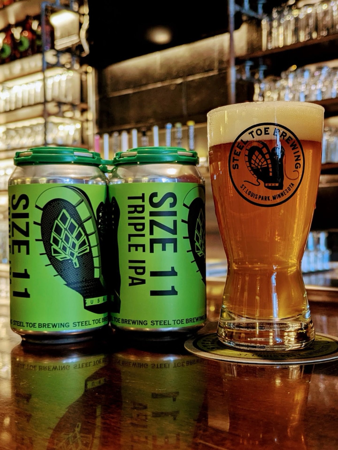 🍻🥾 SIZE 11 IS BACK! 💪🍻

This beastly Triple India Pale Ale is the biggest of siblings to Size 7. Aromas of ripe Honey dew and citrus explode at first sniff. Built on the same back bone as Size 7, but turned up to 11 in all aspects. Malt sweetness