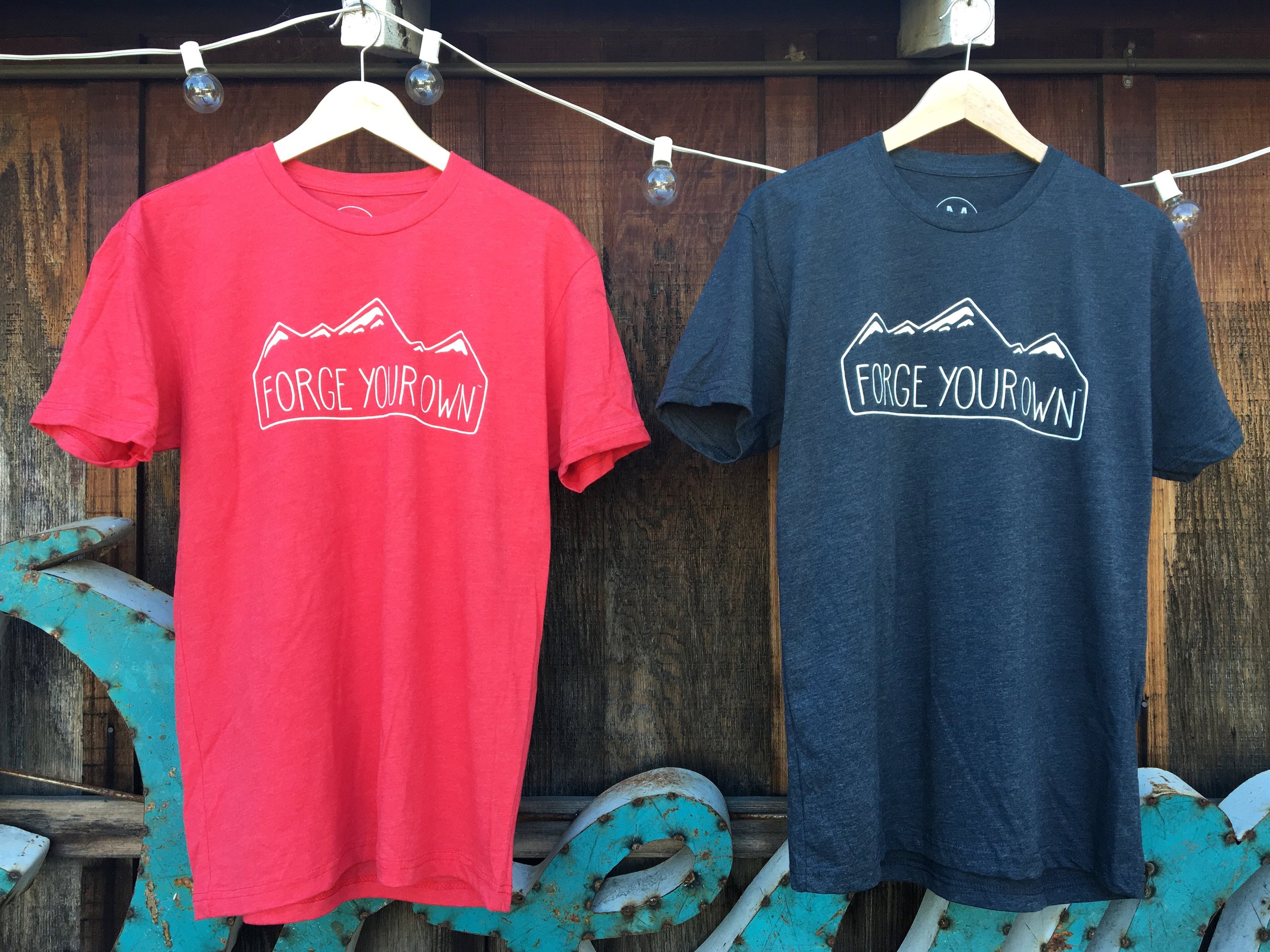 Red and Charcoal shirts will be available with the "forge your own" mountain design on them.