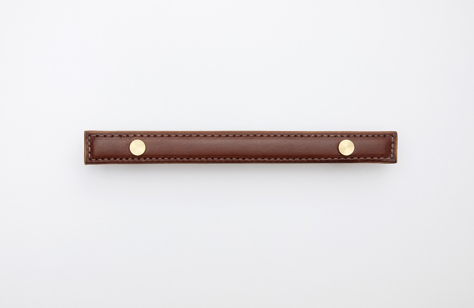 Brown leather handle with machine stitching and solid brass hardware