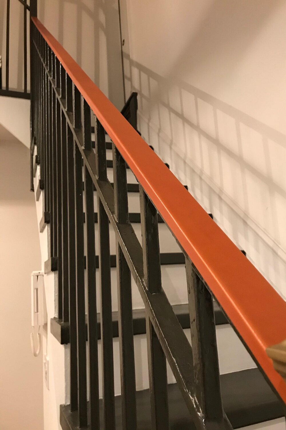 Natural colored leather handrail