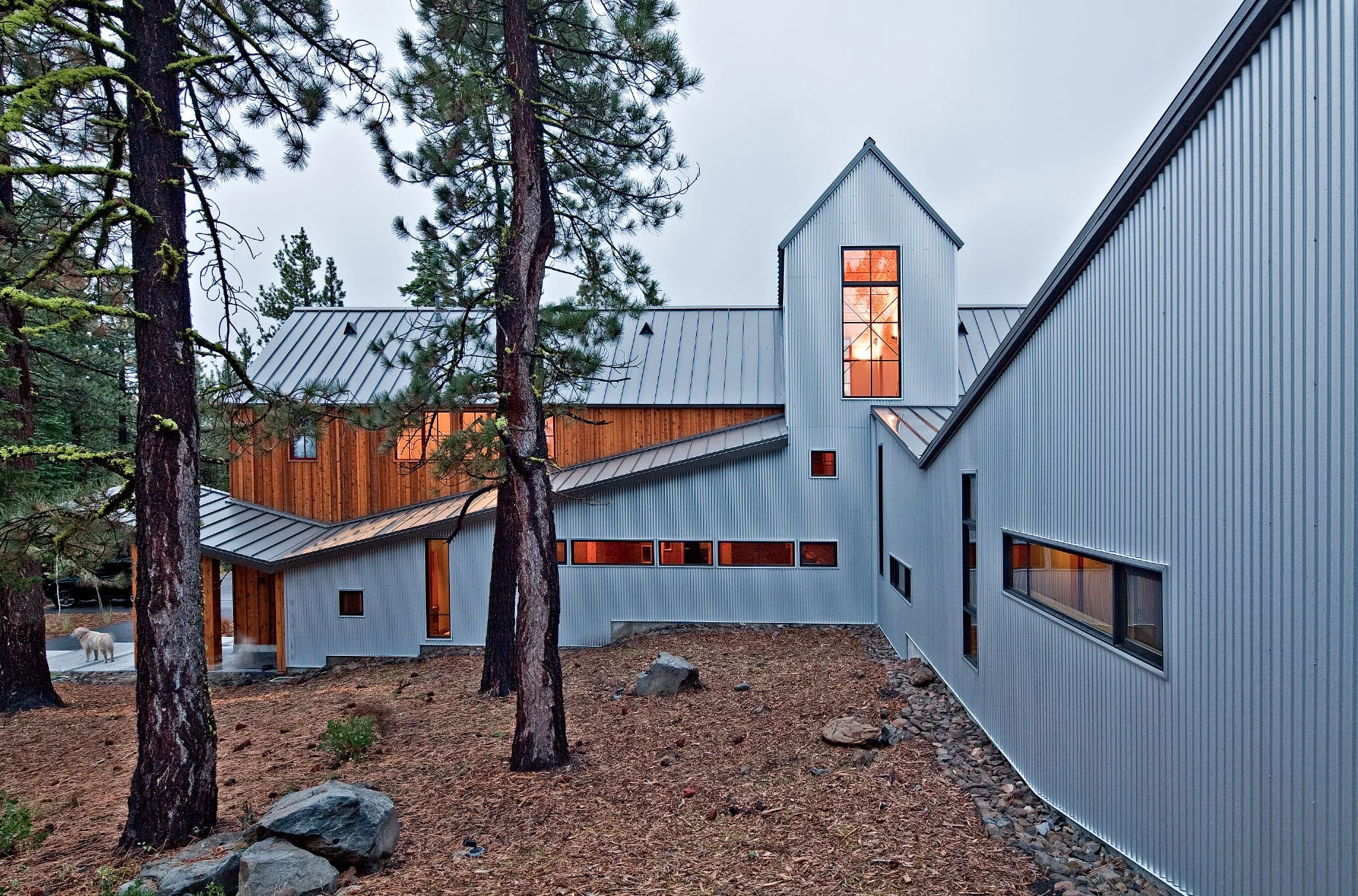 Cascading roof lines in spirit of historical mining buildings - Lake Tahoe Modern Home
