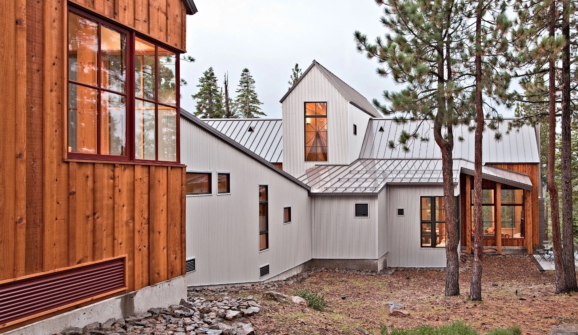 Exterior with metal siding and cedar - Lake Tahoe Modern Home