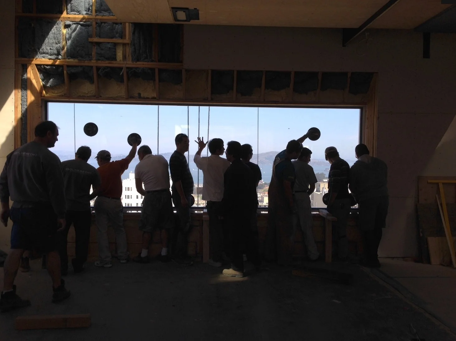 Installing the new fifteen foot wide single pane window