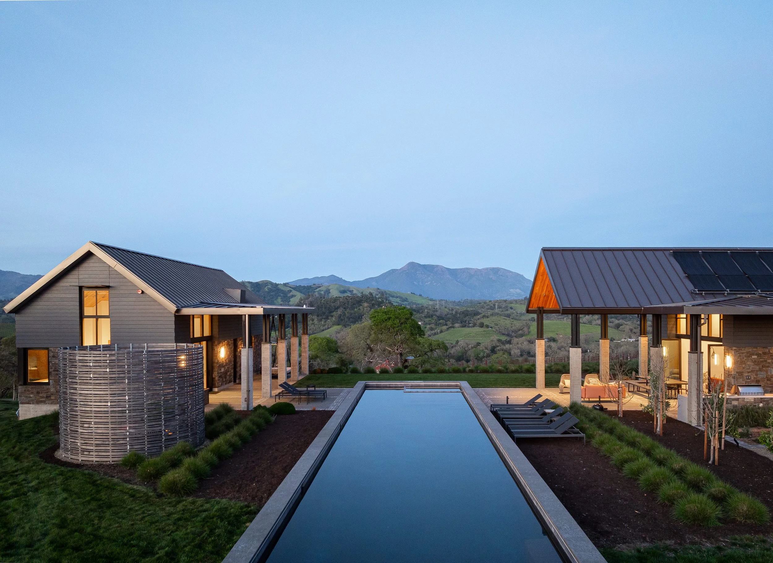 modern compound of buildings with pool on axis