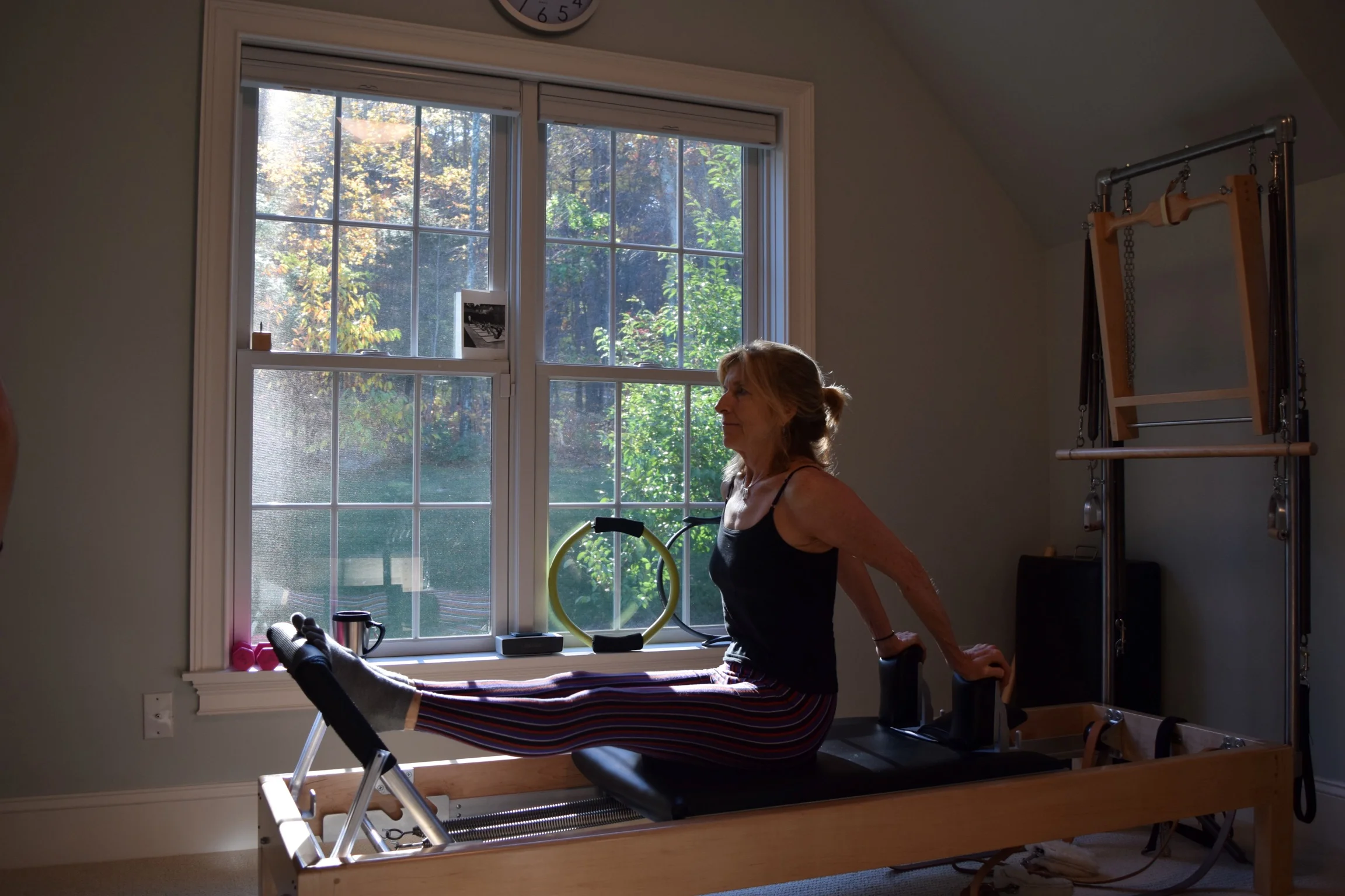 Leslie, a Pilates student from Unionville, CT, starting the day off right.