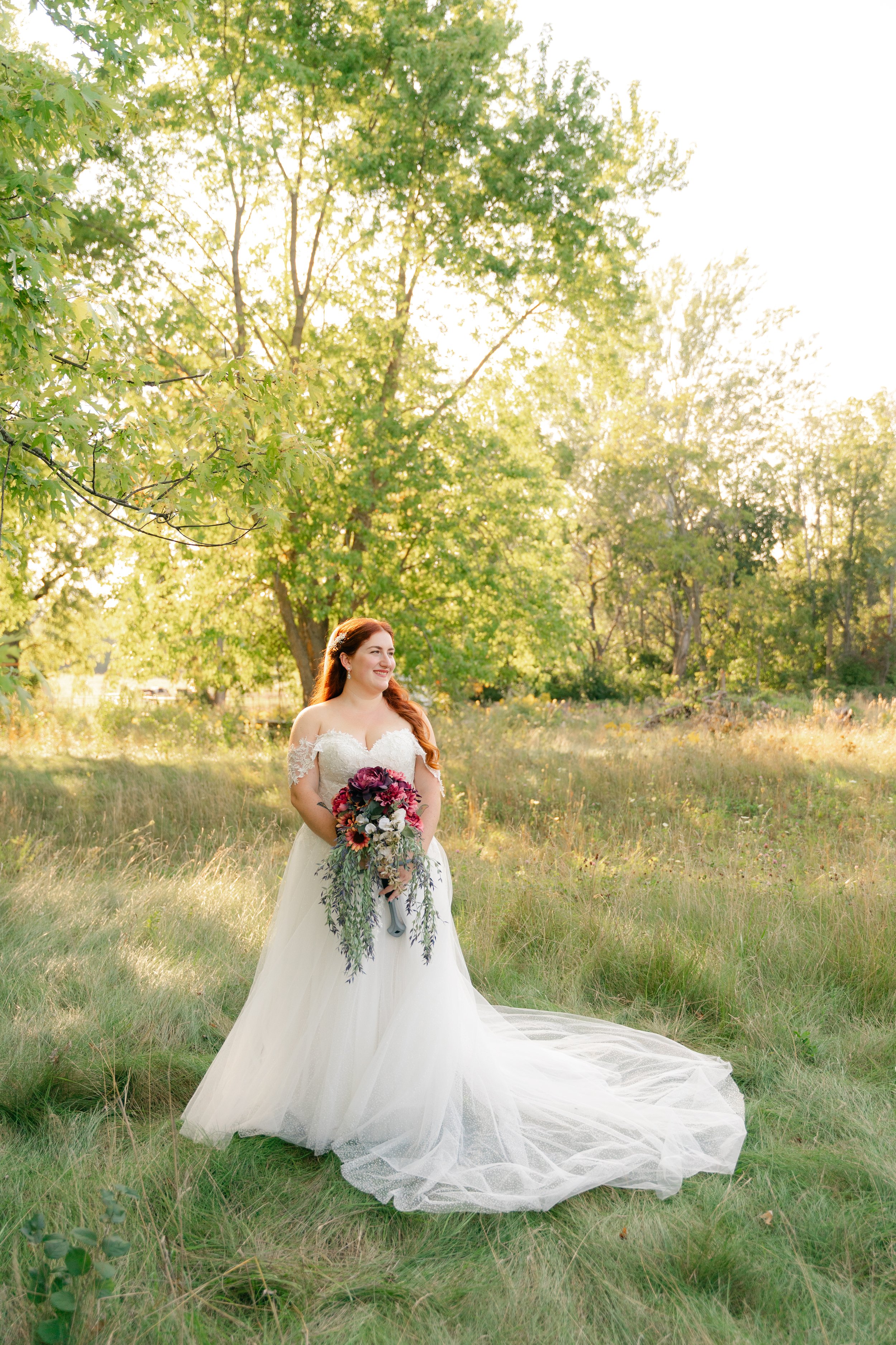 Bride poses for a photo outside of Lilac Acres in Waukesha Wisconsin