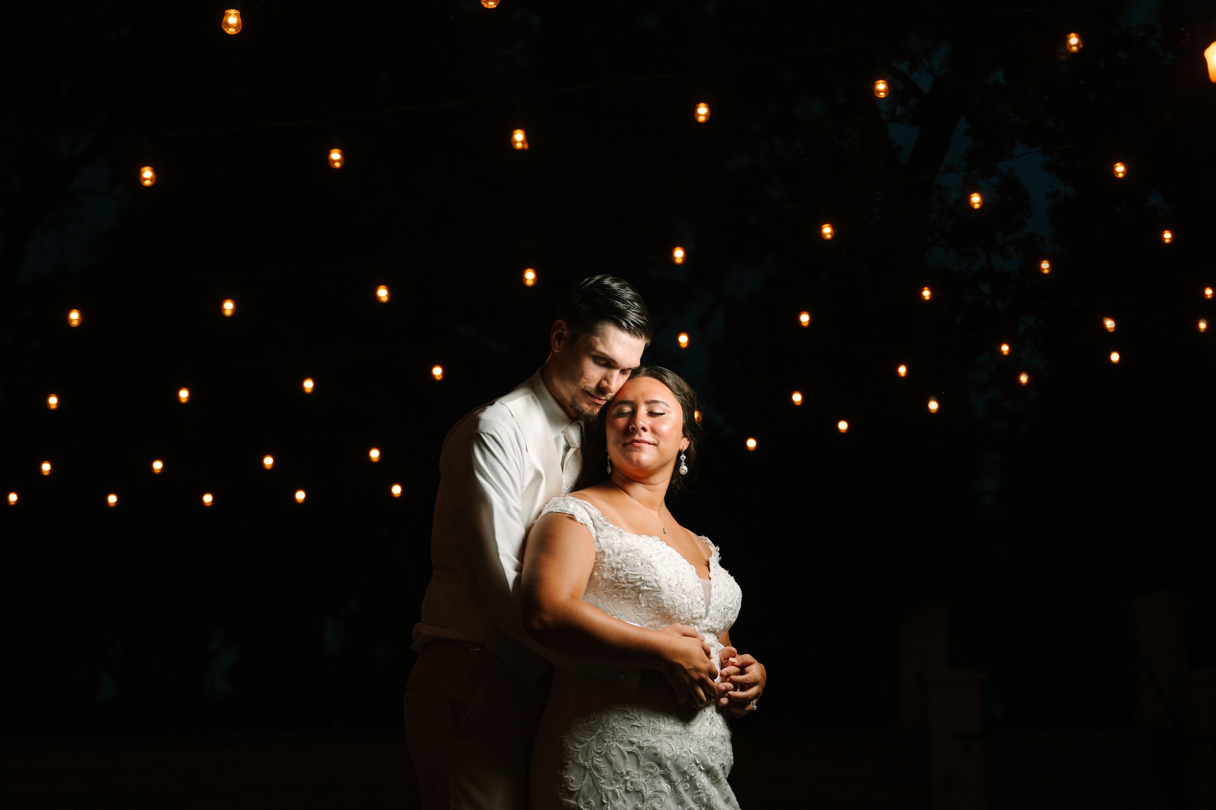 An intimate night shot of a stunning bride and groom in Burlington, Wisconsin