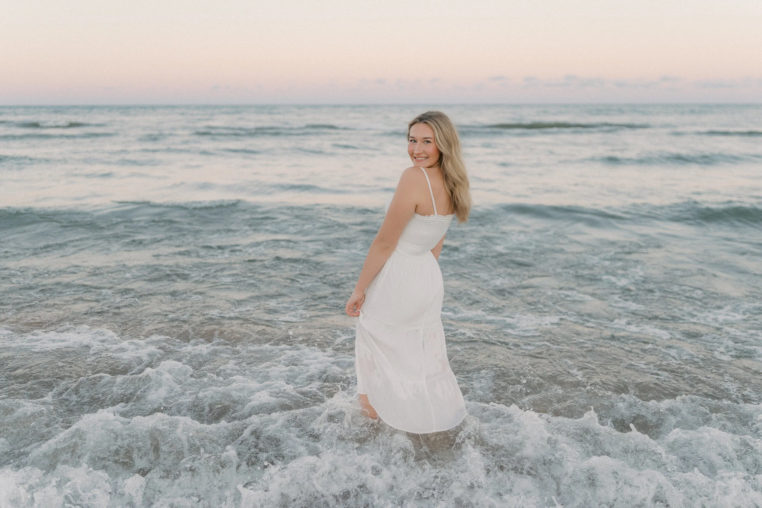 High school senior portraits at beautiful Lake Michigan beach near West Bend, Wisconsin.