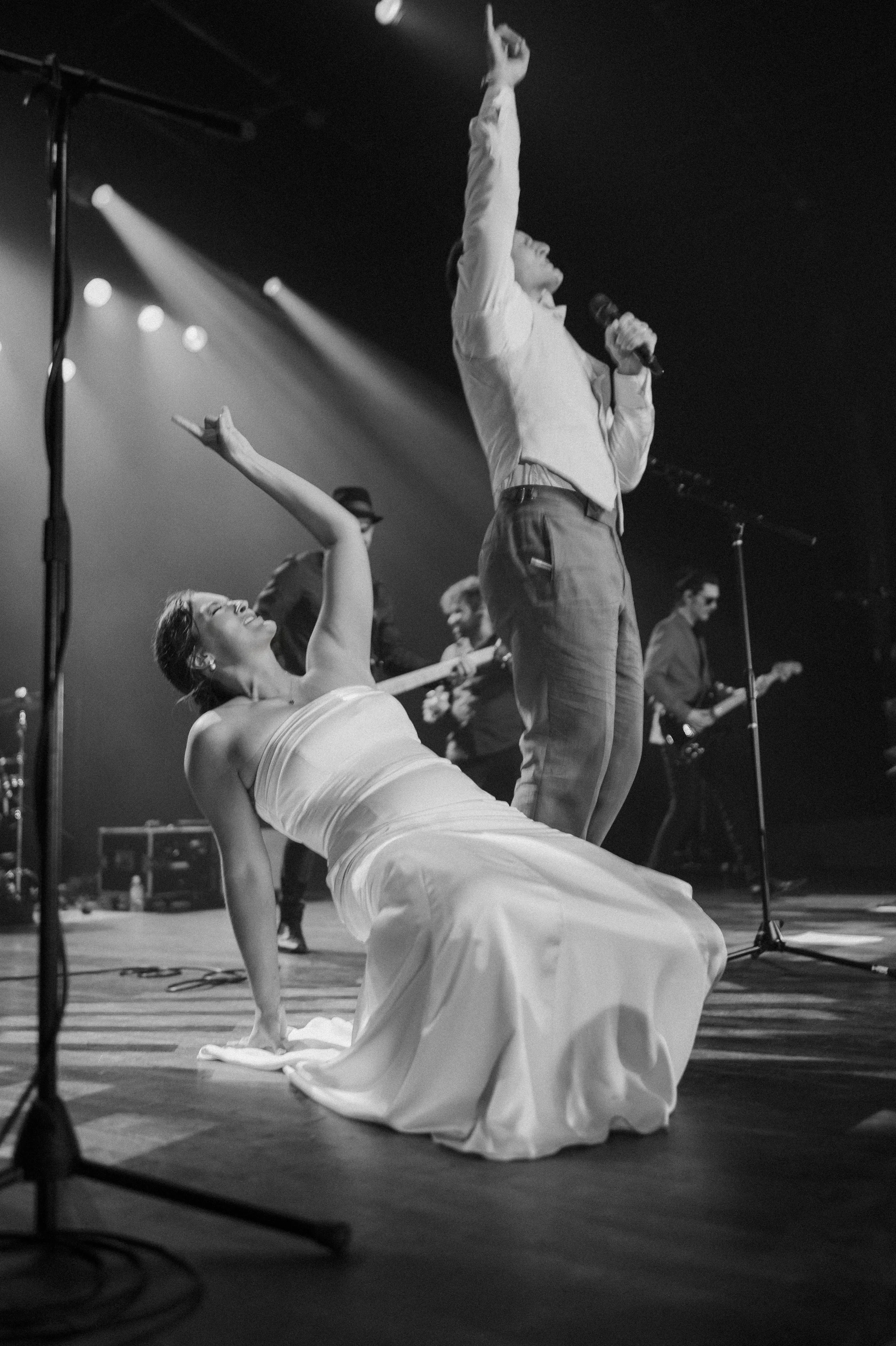 Bride and groom under stage lighting during a Turner Hall Ballroom wedding