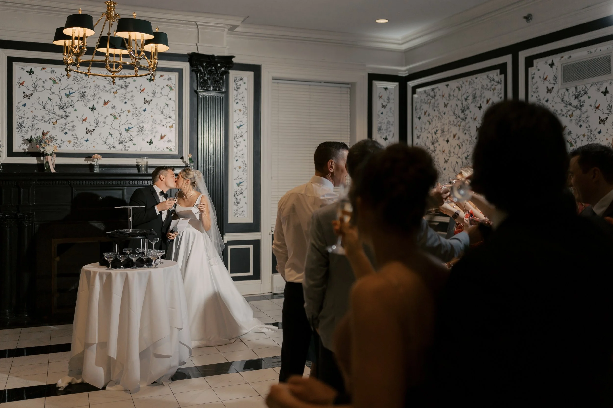 Wedding reception at The Madison Club in Madison Wisconsin with guests celebrating indoors
