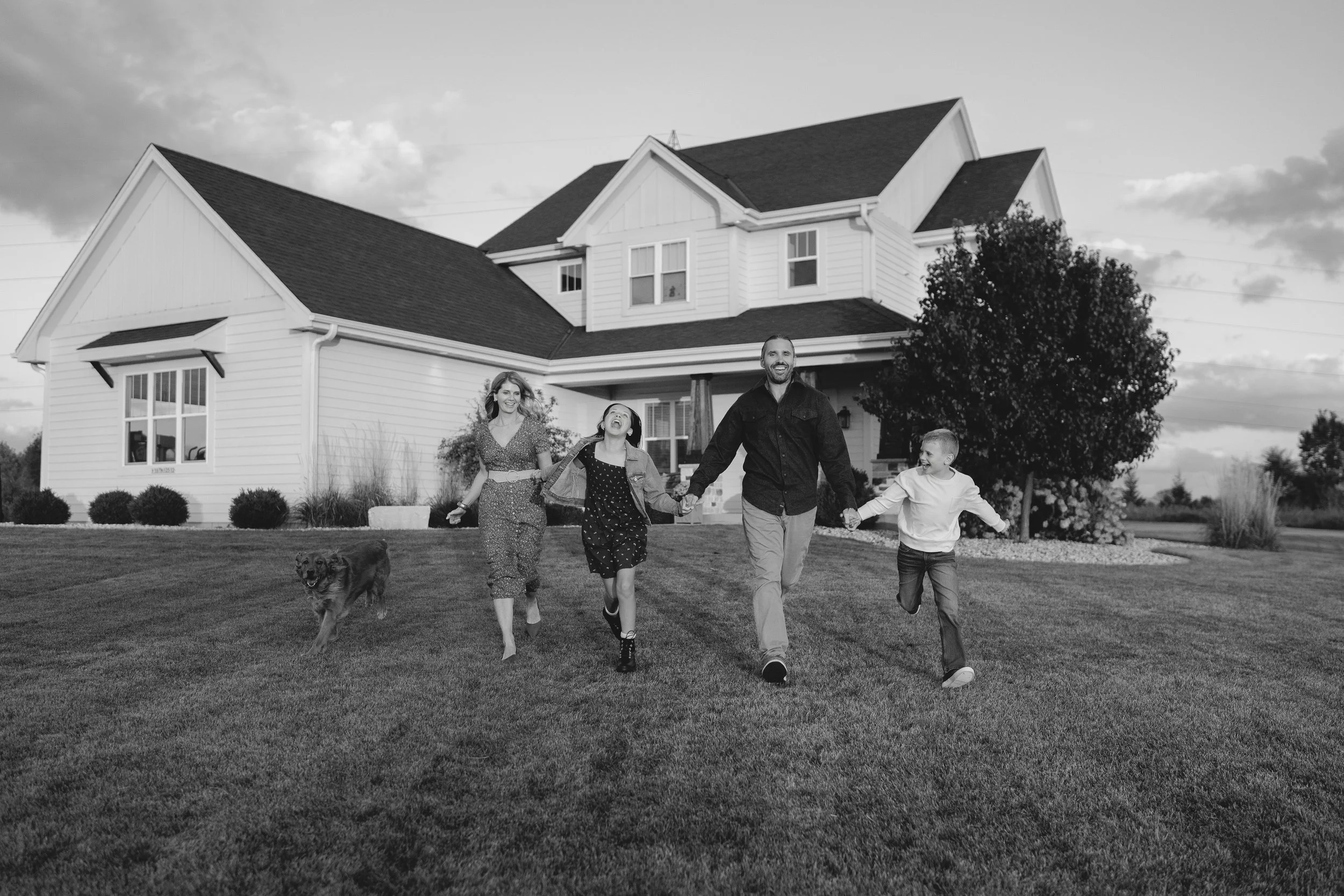 A fun and candid moment during family portraits in West Bend, Wisconsin.