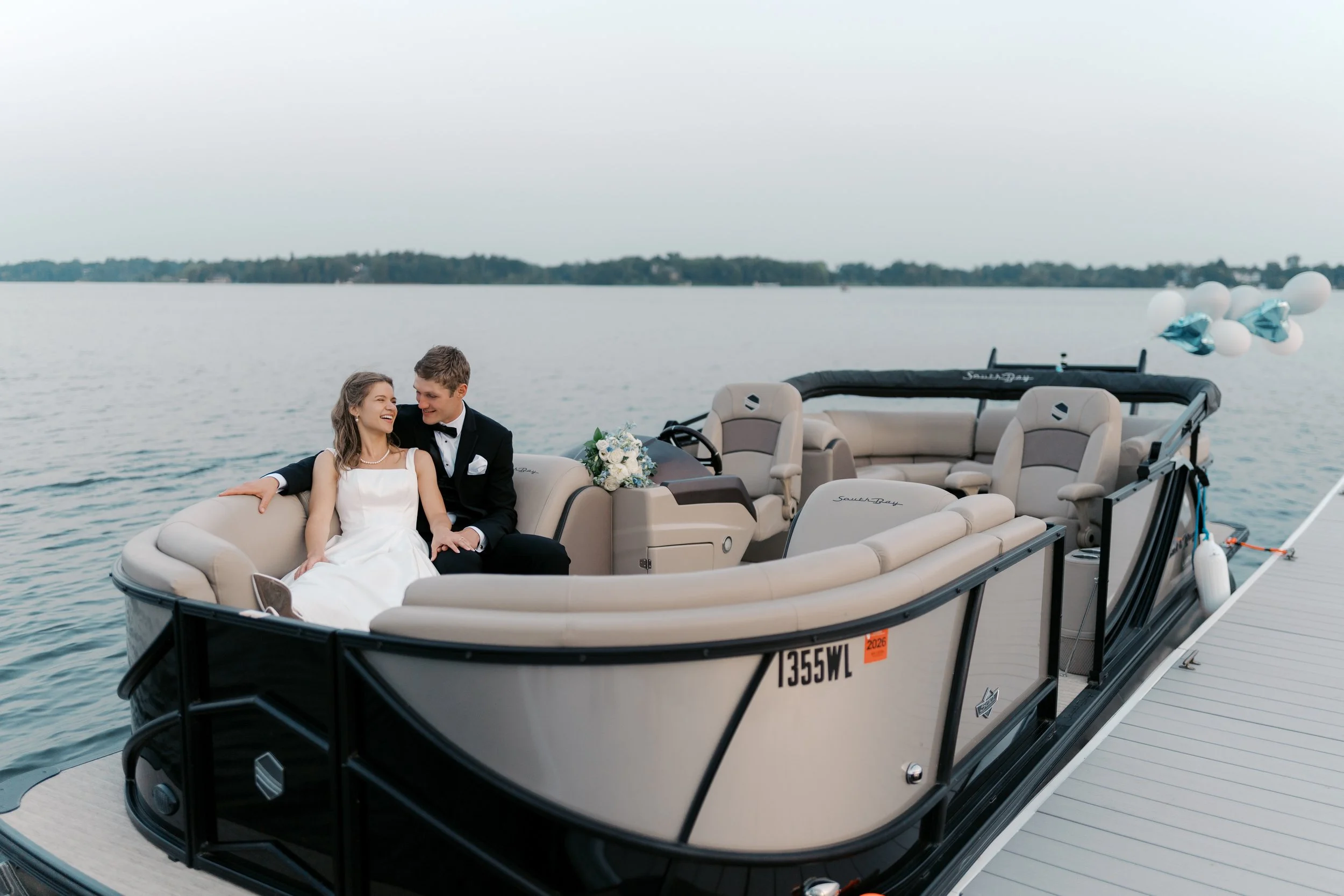 Lakeside wedding portraits in Milwaukee during golden hour