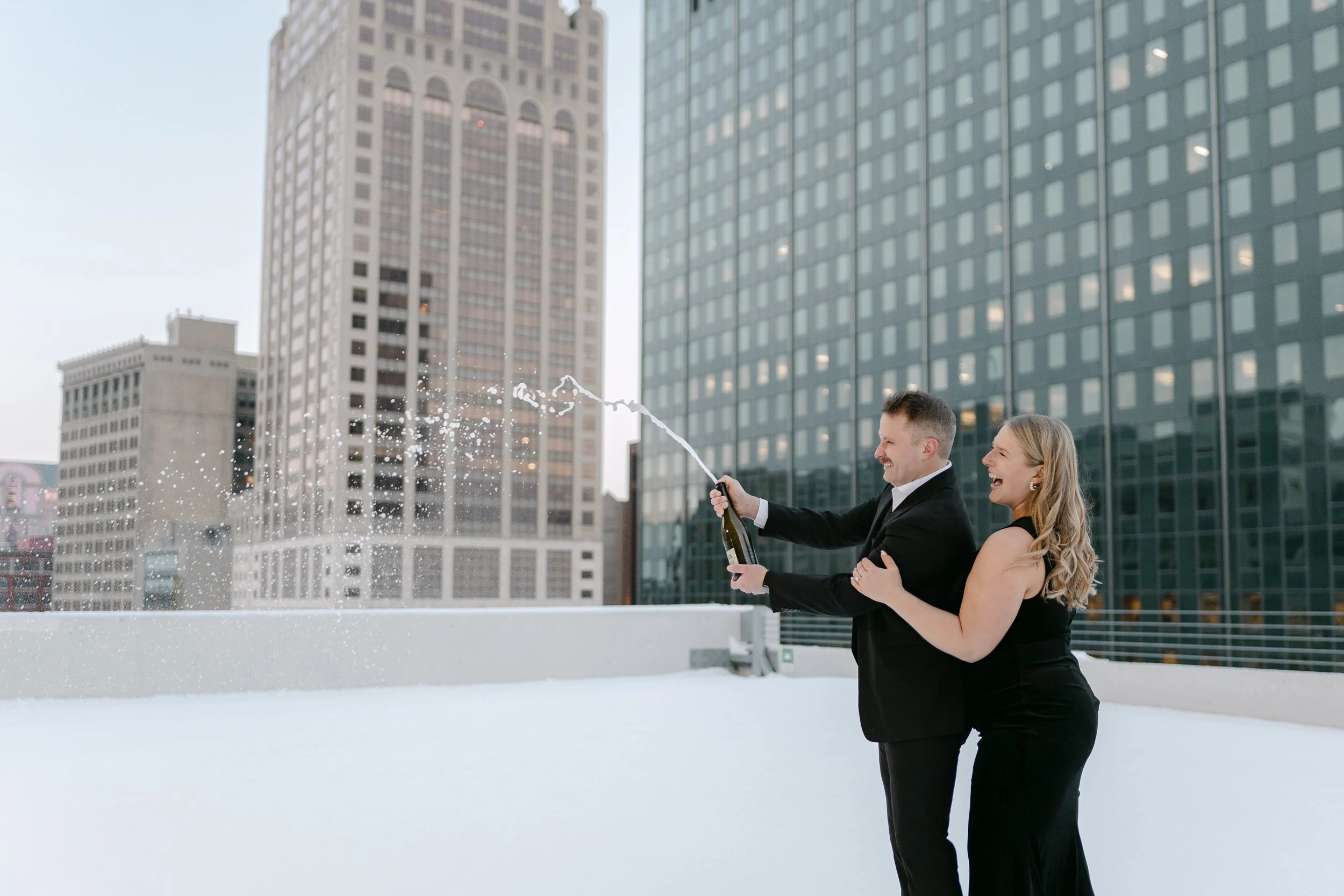 Candid engagement session moments with a relaxed couple in Milwaukee Wisconsin