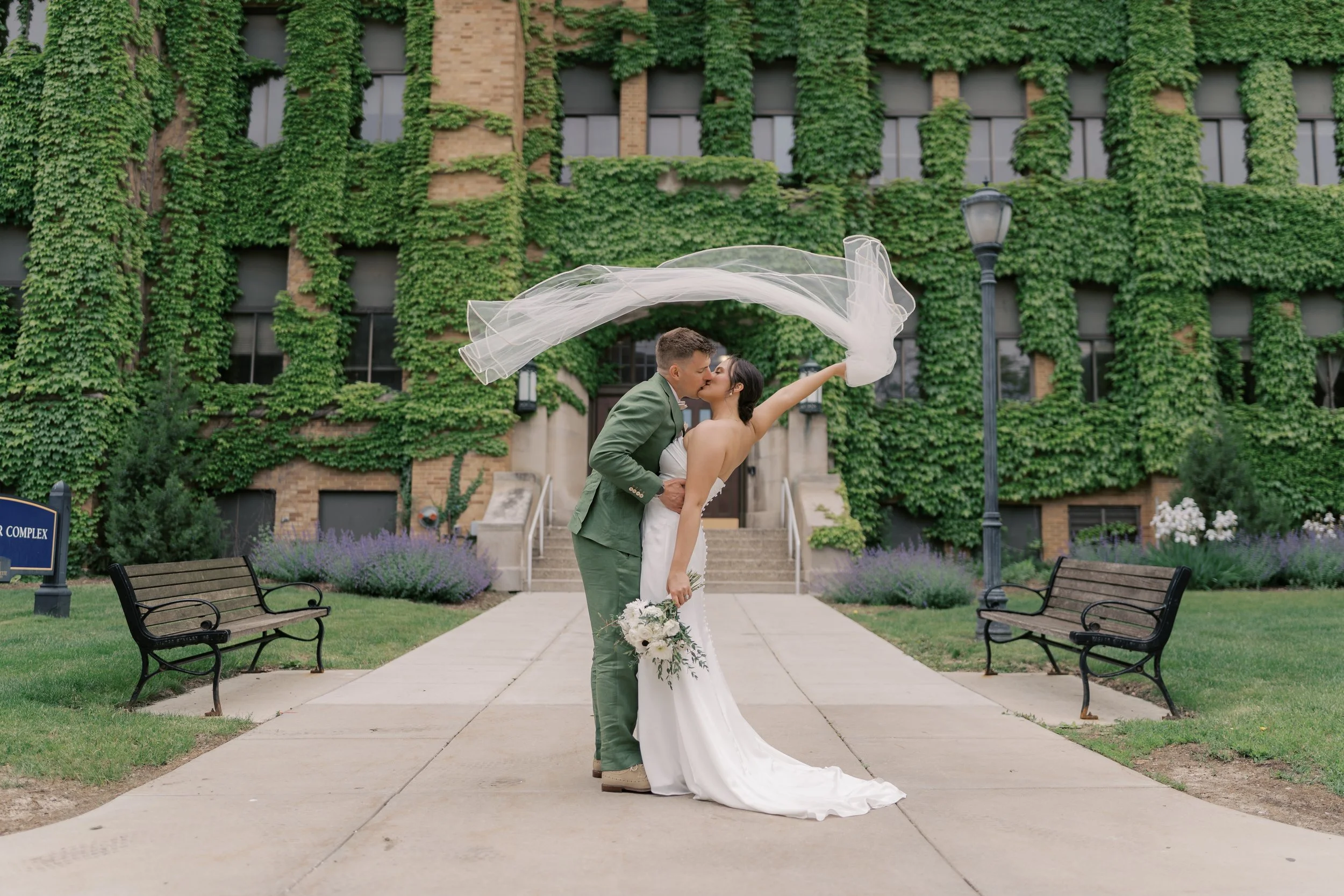 A couple celebrates their wedding day on the Marquette campus in Milwaukee.