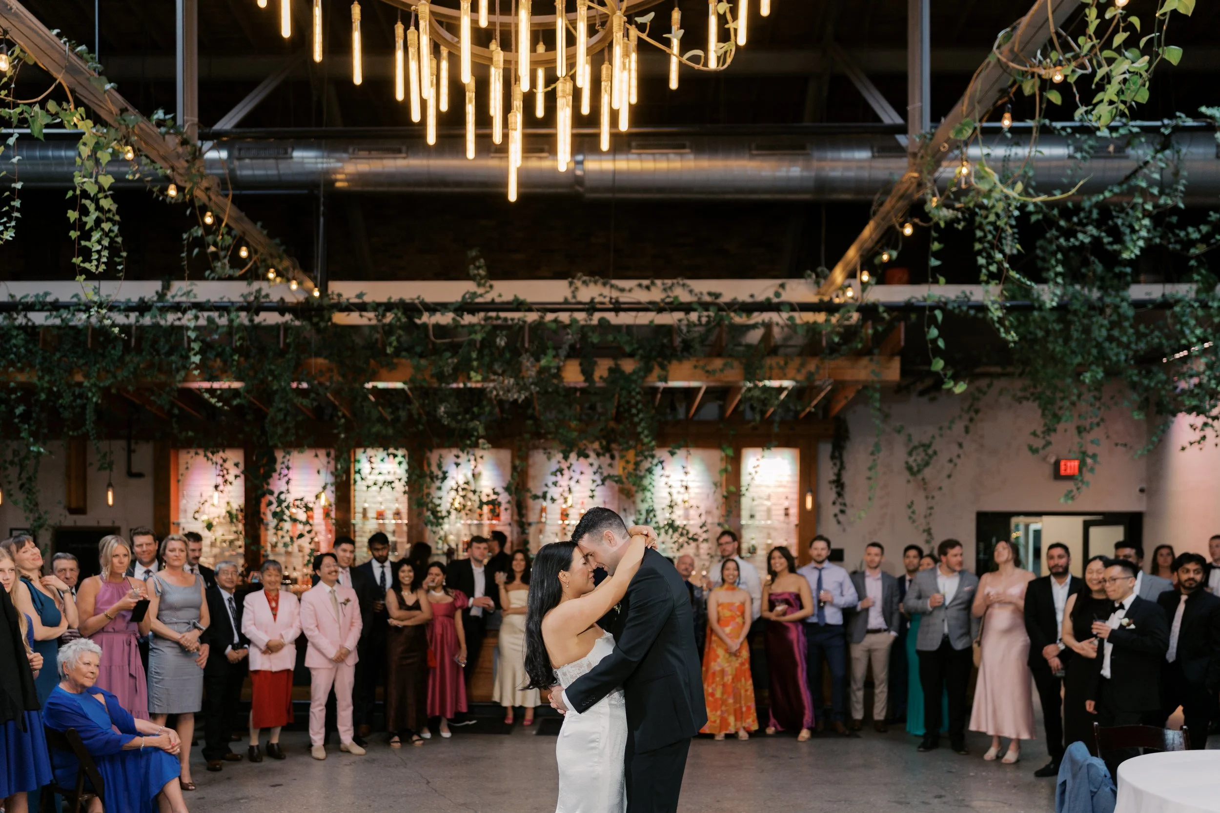 Candid wedding reception moments at The Ivy House in Milwaukee, Wisconsin