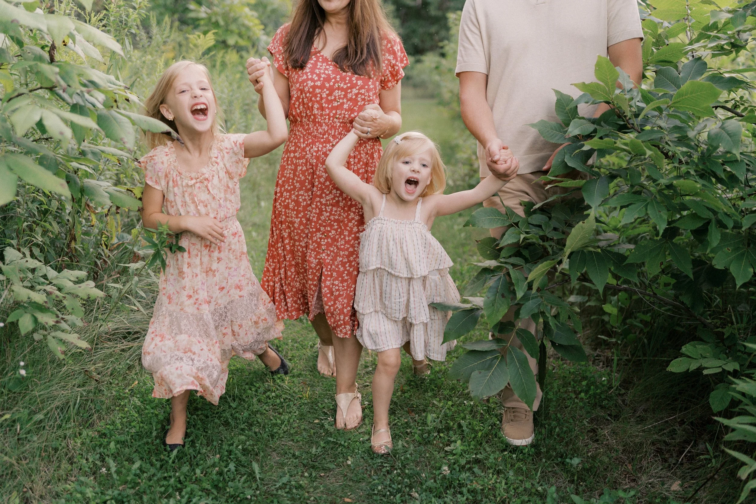 Laughing family candid West Bend Wisconsin