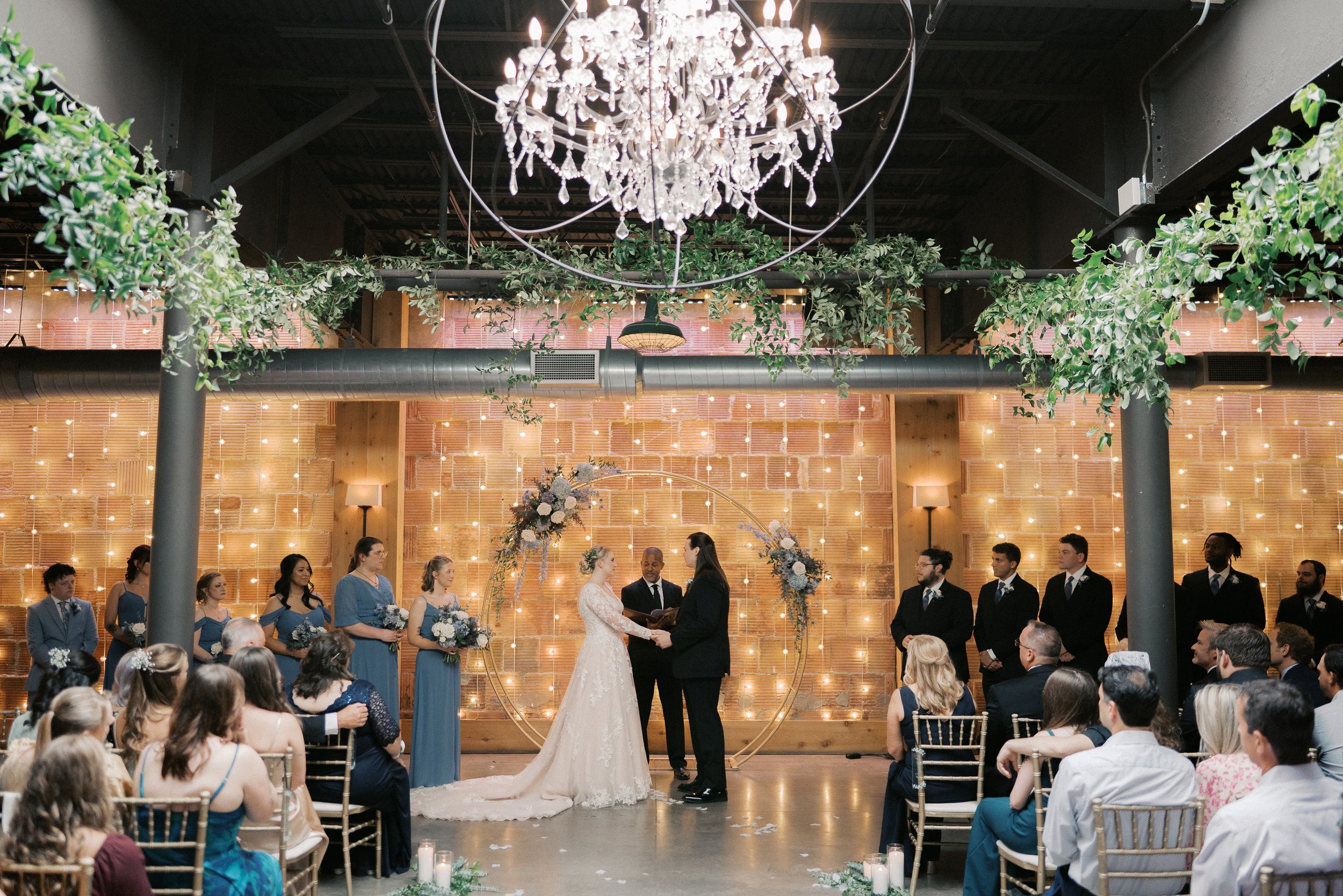 Light-filled ceremony at The Atrium Milwaukee wedding venue