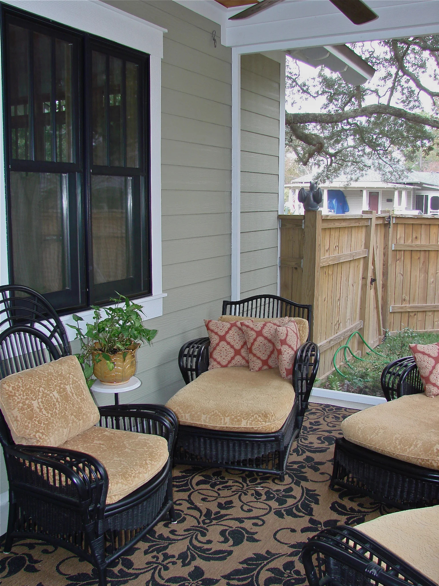 Screened porch on side of home