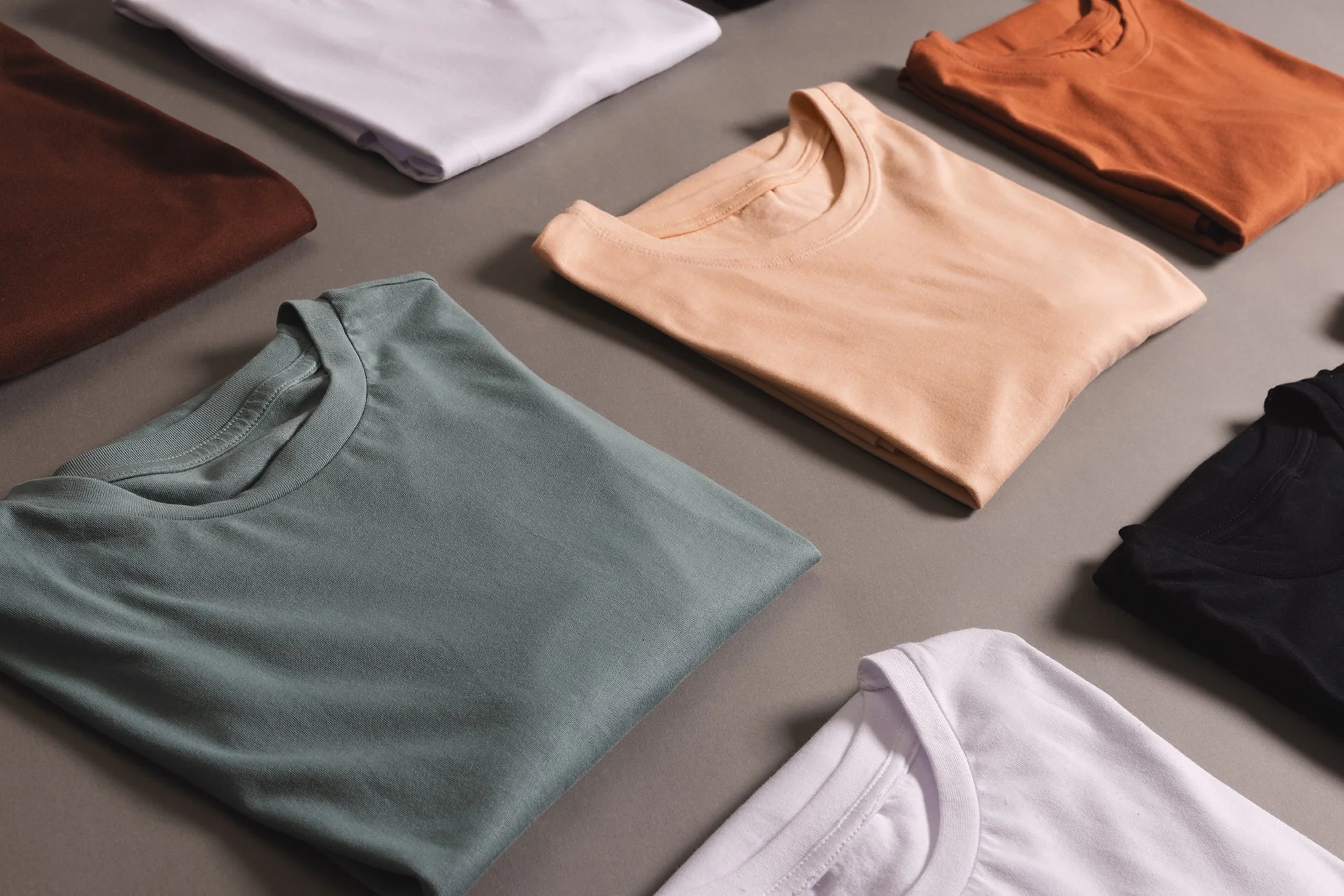 multi-coloured-t-shirts-with-copy-space-on-grey-fl-2023-11-27-05-23-45-utc.jpg