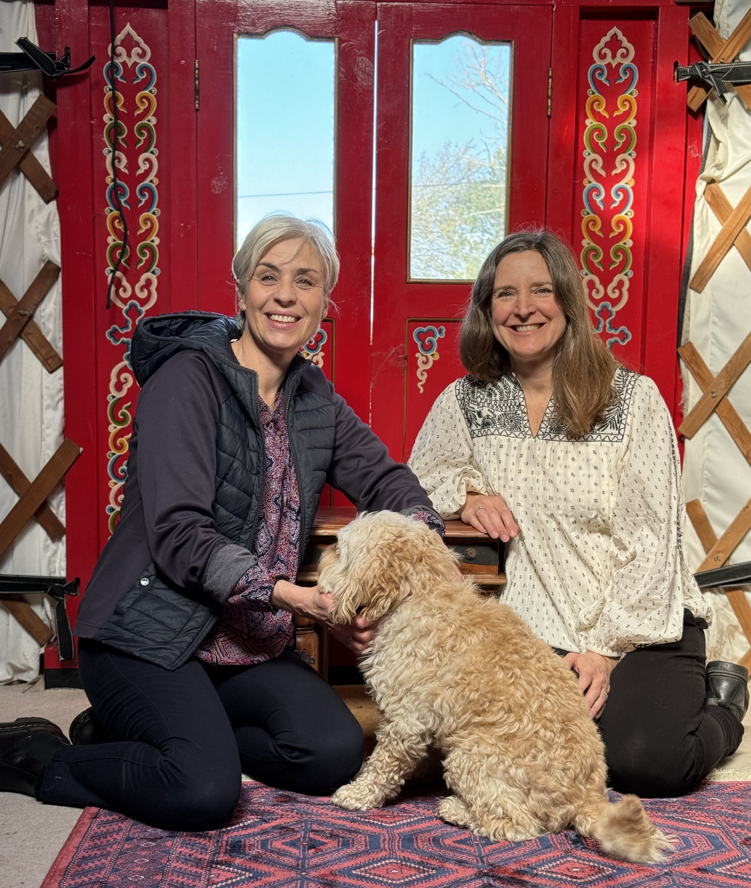 Bex and Debbie with dog by door yurt.jpg