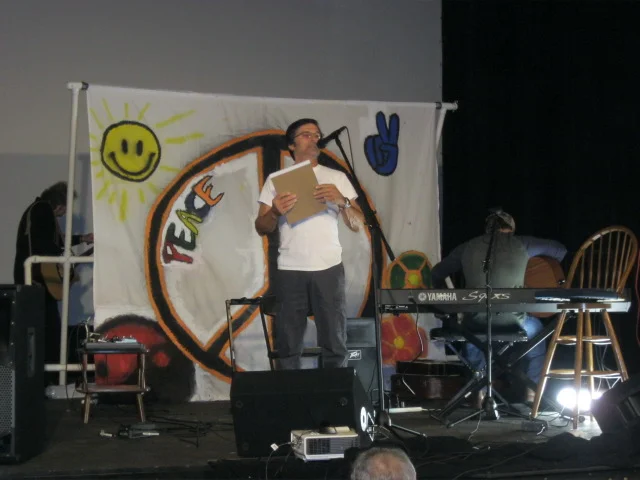 Rick emceeing at the Henn Theater, November 2014