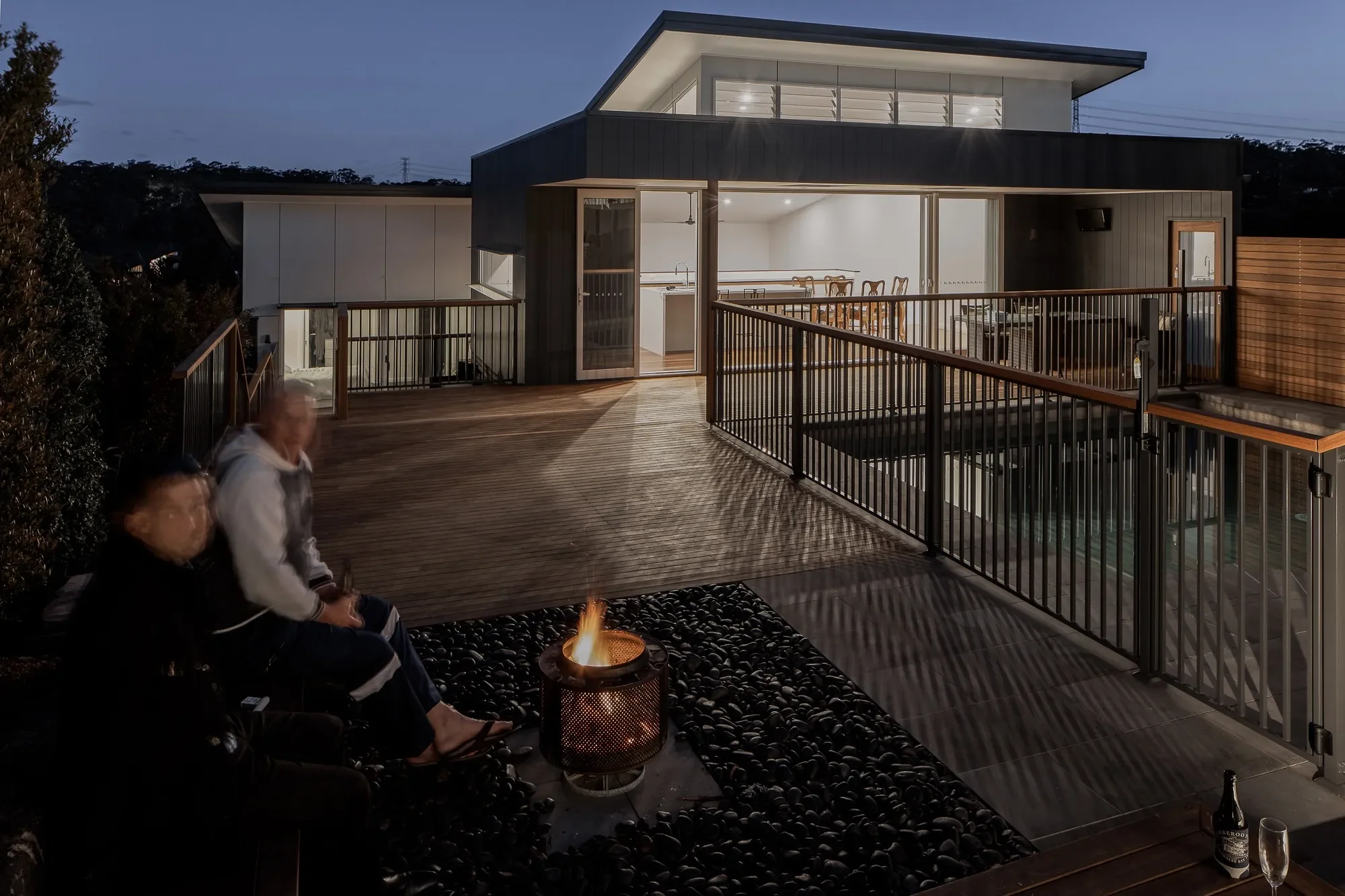 Outdoor terrace with firepit in Sydney home