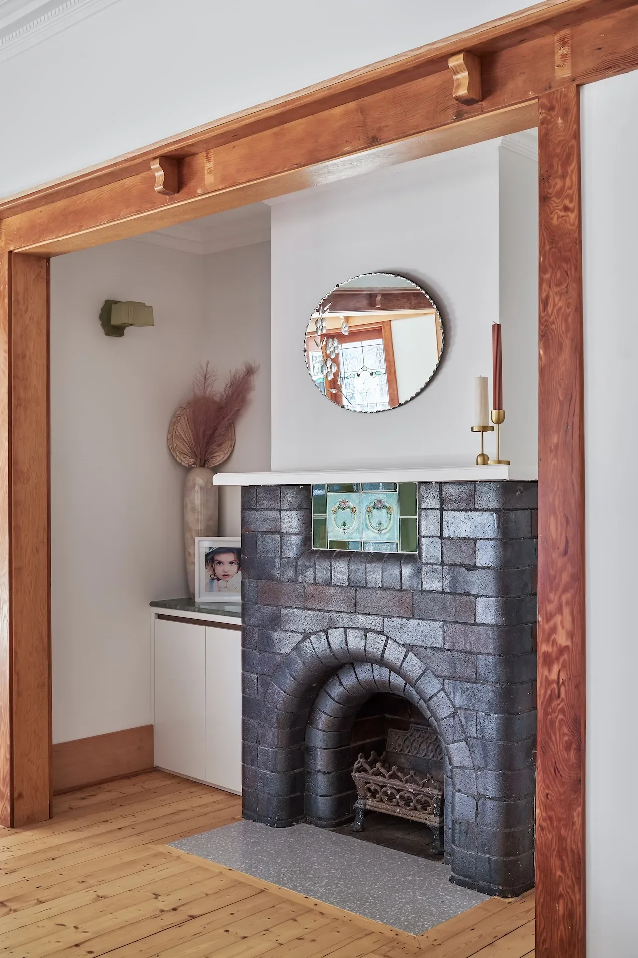 Restored fireplace in heritage home interior