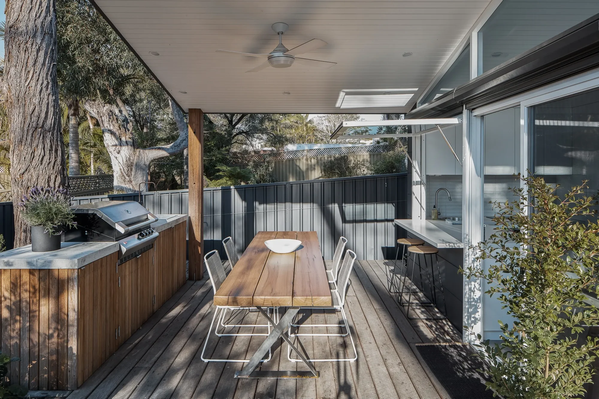 Outdoor dining deck in small home design