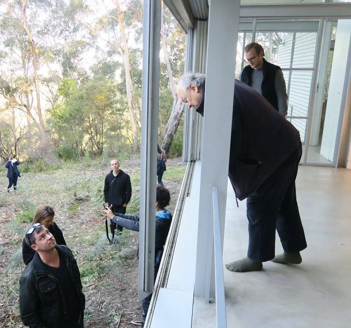 Glenn explaining the sliding door system at Simpson-Lee House (photo by Sophia van Greunen)