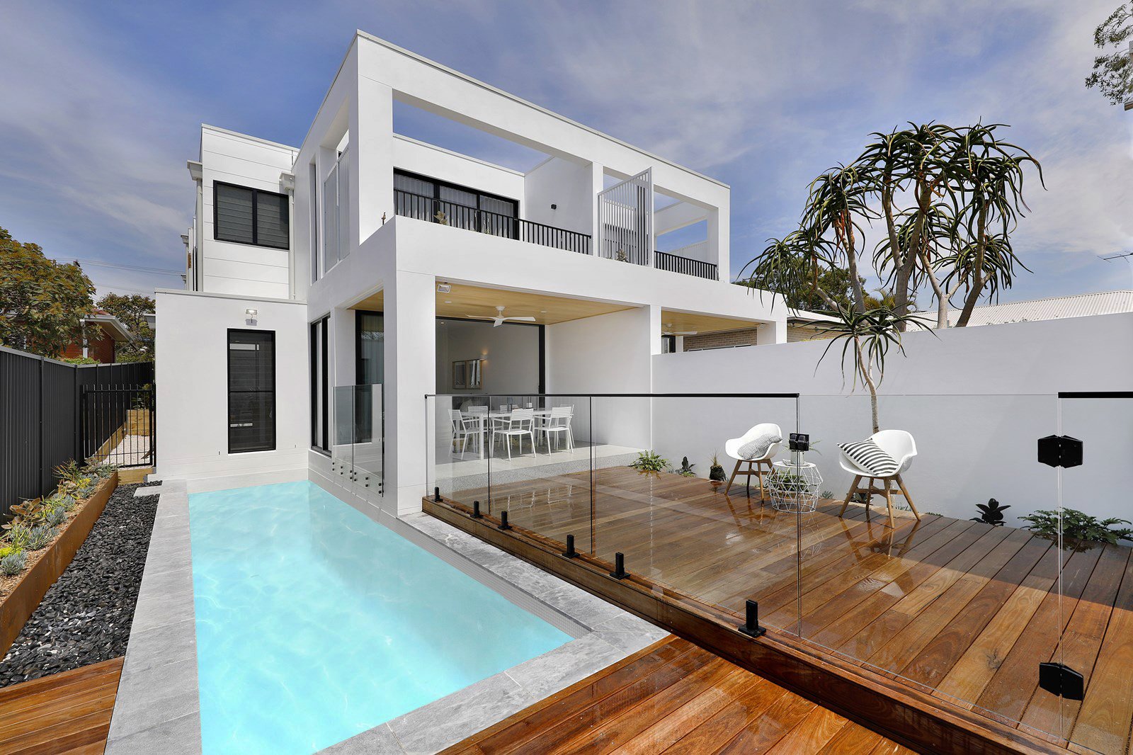 Luxury home design in Collaroy Sydney with pool, timber deck and contemporary coastal architecture