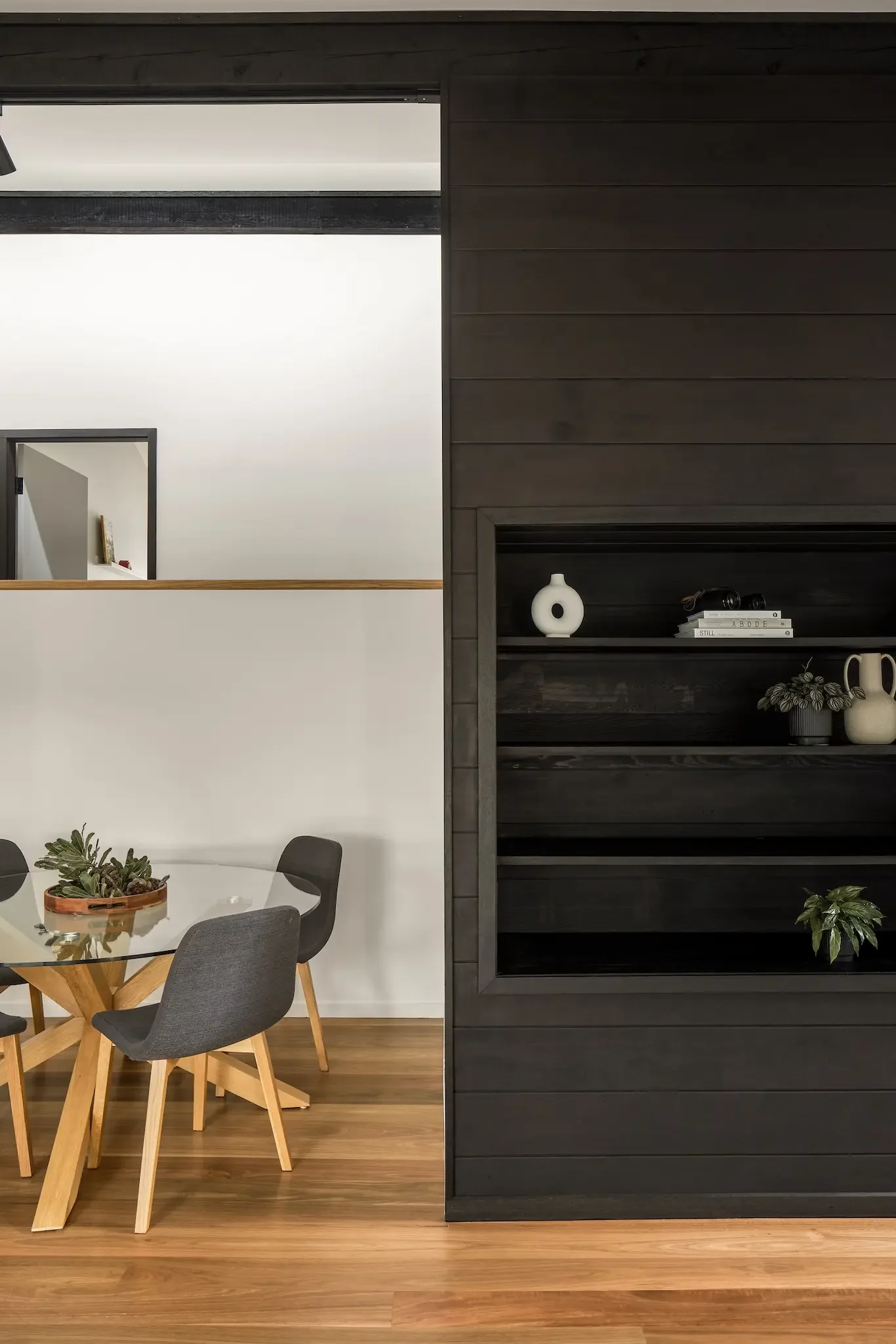 Open plan kitchen and living in bush house