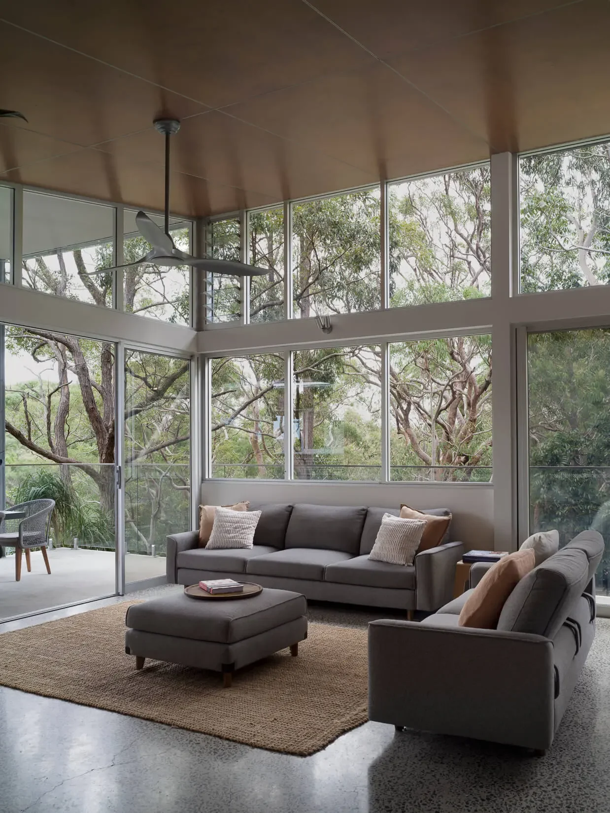 Living room opening to bushland in Bayview home