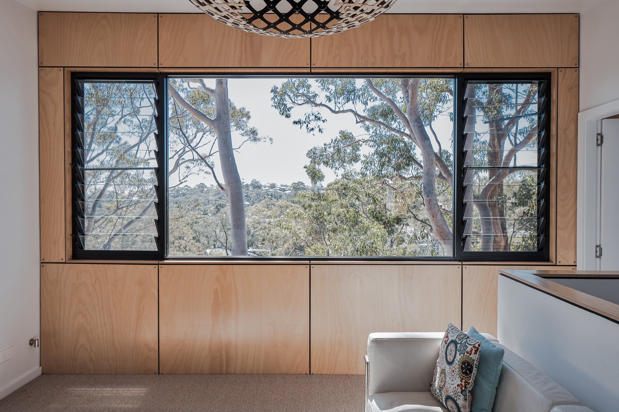 Window seat designed to maximise natural light in Cammeray architect designed home