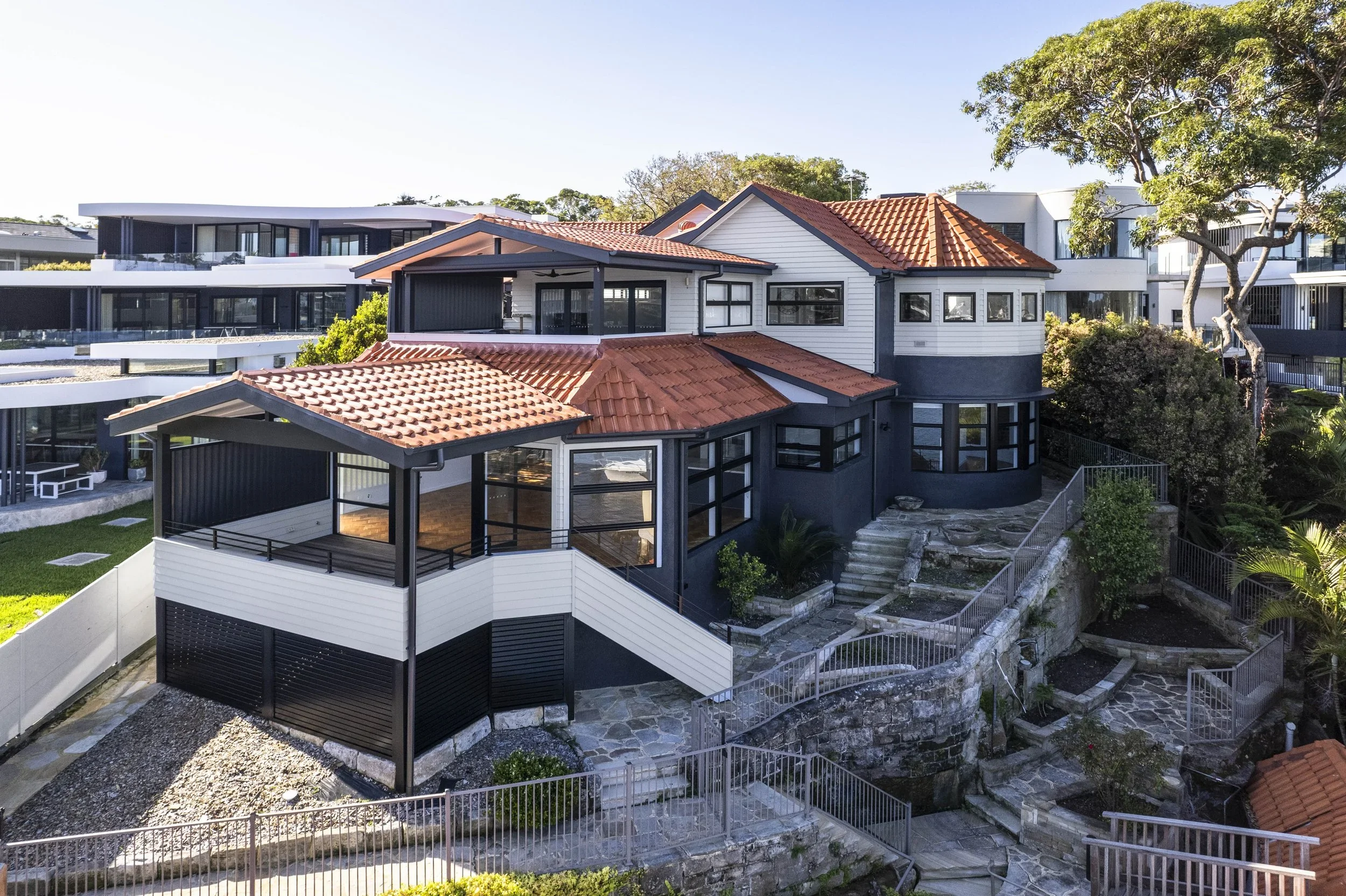 Aerial view of renovated heritage home integrated into neighbourhood