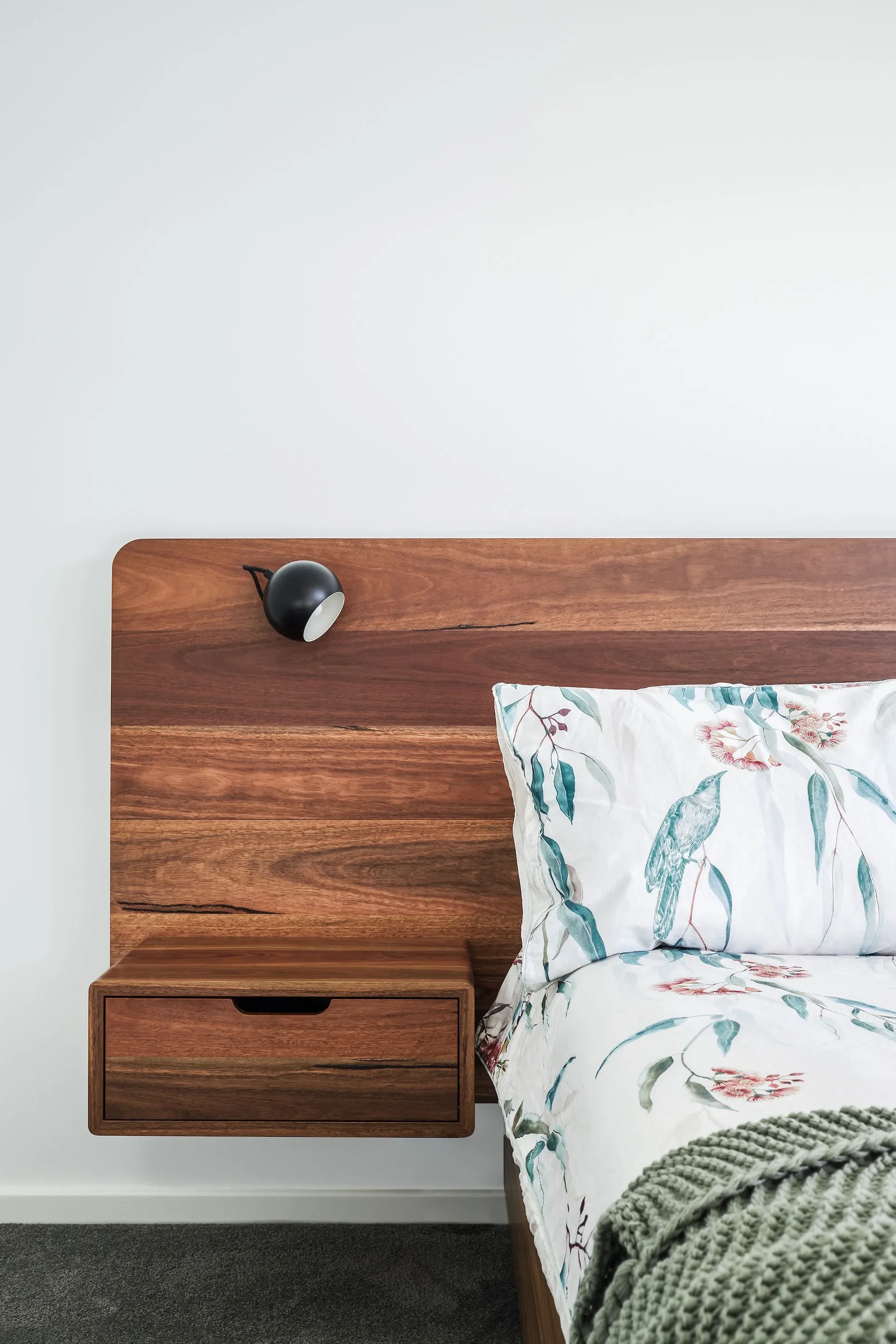 Warm bedroom interior with custom timber joinery in a Gordon residential project