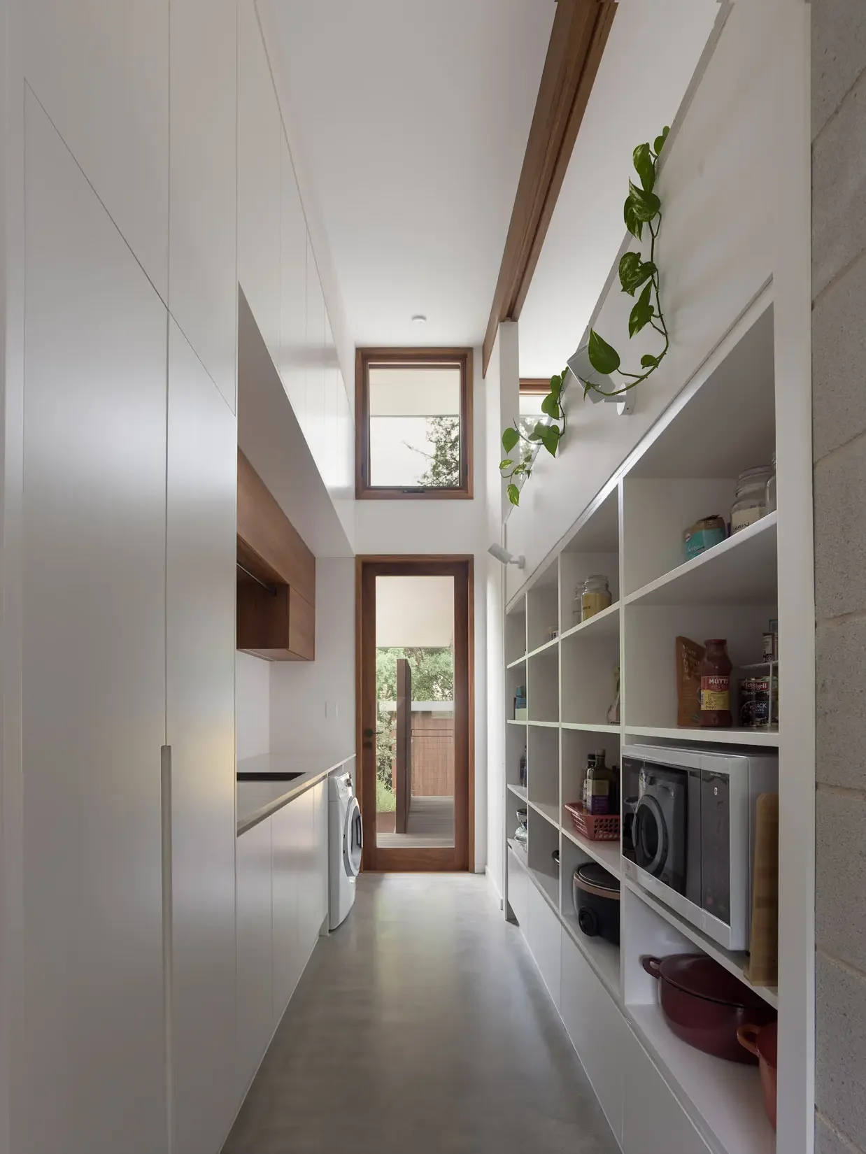 Hallway with natural light in Upper North Shore home