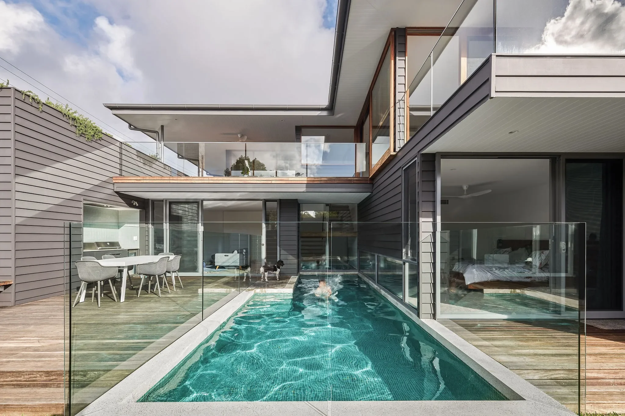 Family new home with pool designed by Ironbark Architecture in Freshwater