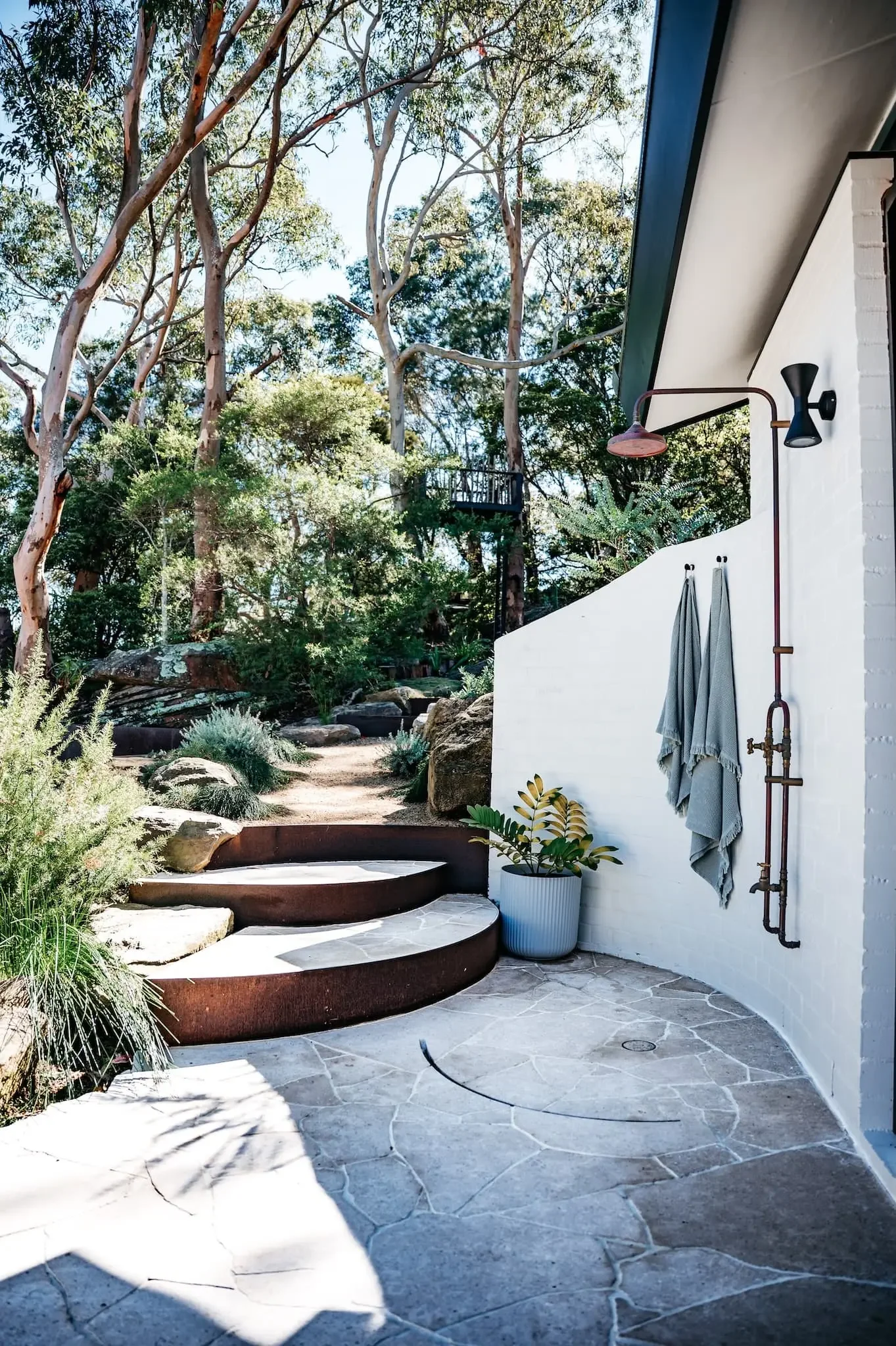 Landscape native design integrated with Loftus home