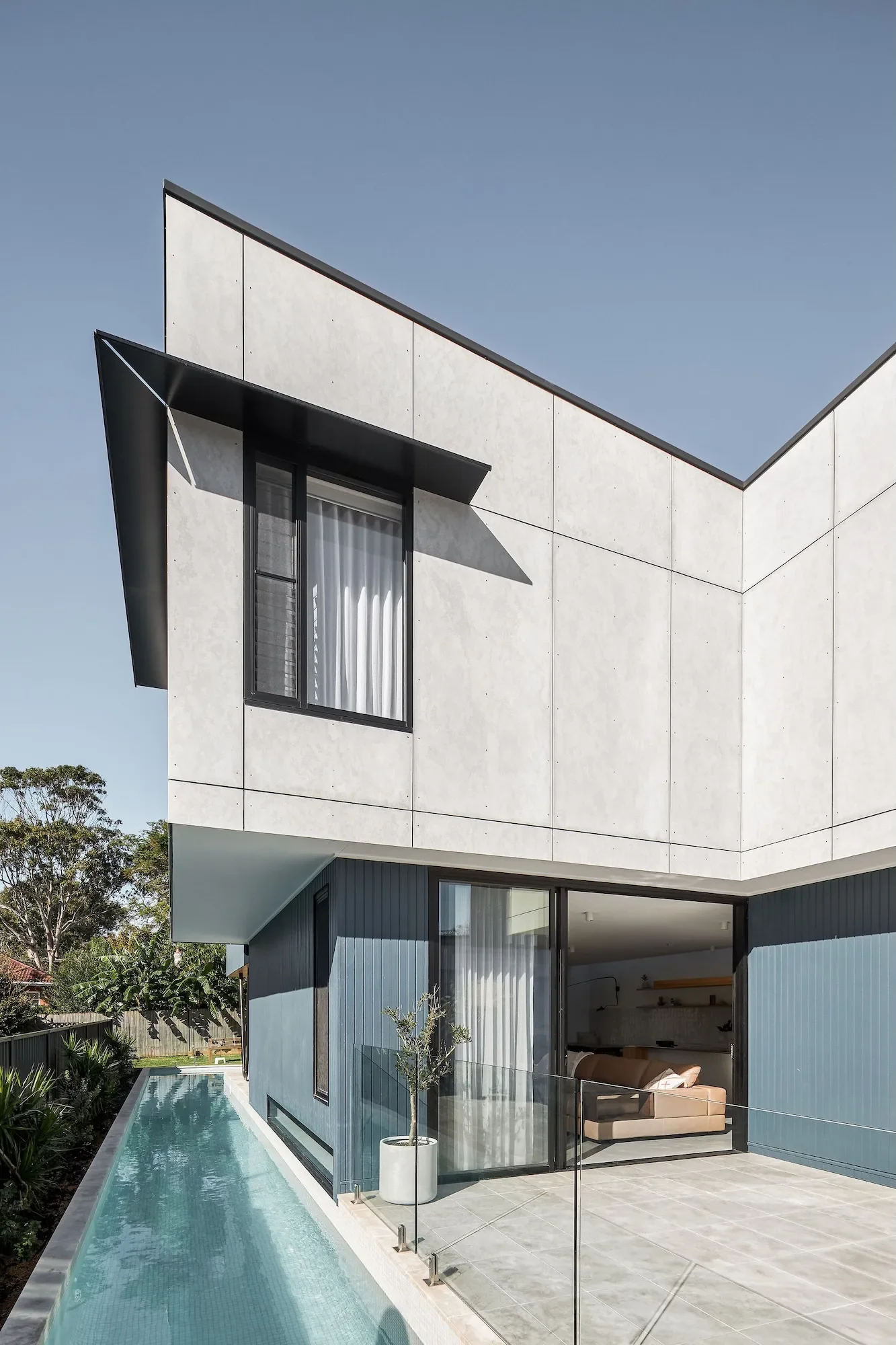 Contemporary Northbridge home exterior with sculptural facade and clean material palette