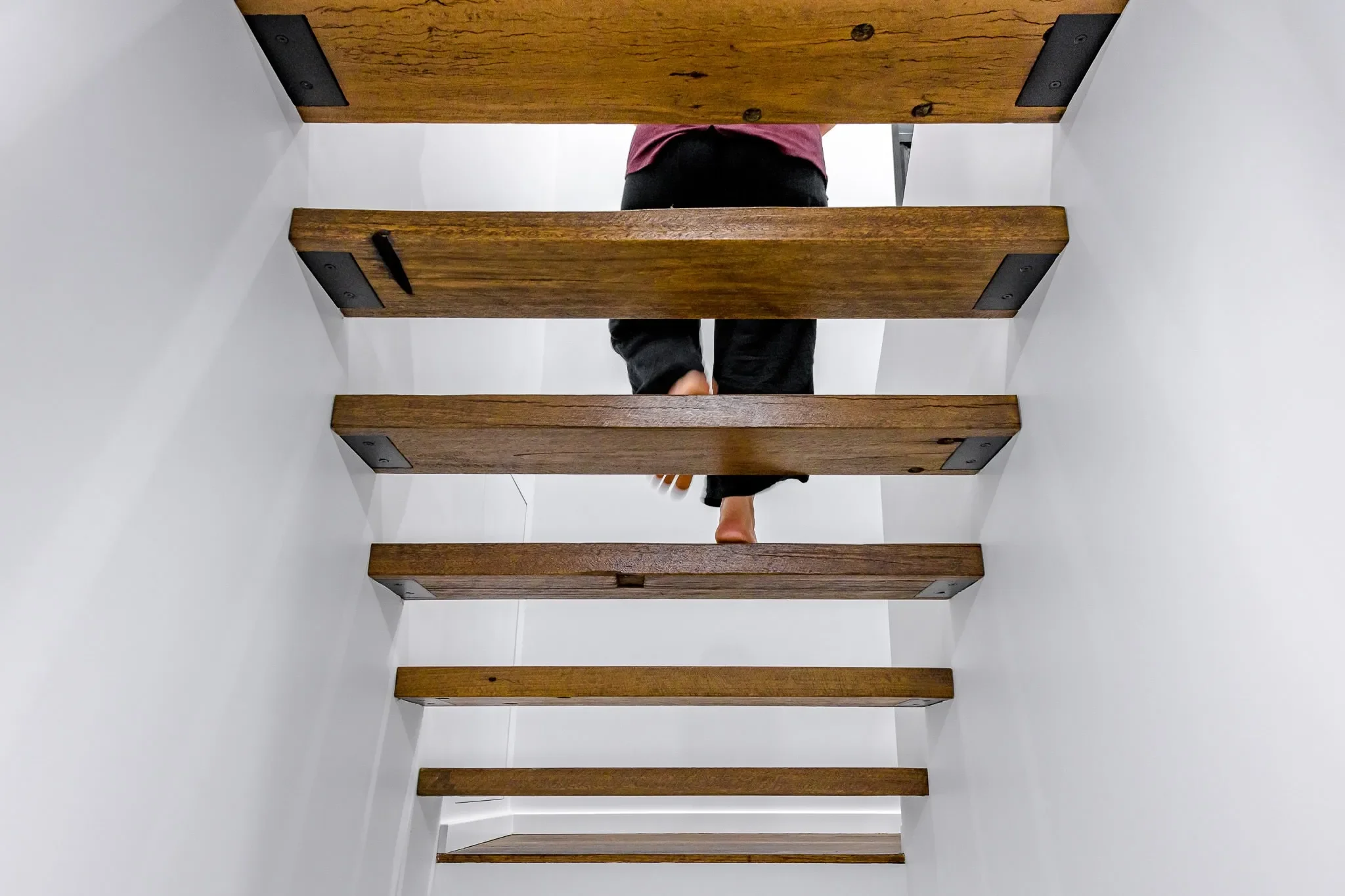 Open riser timber stairs in modern home