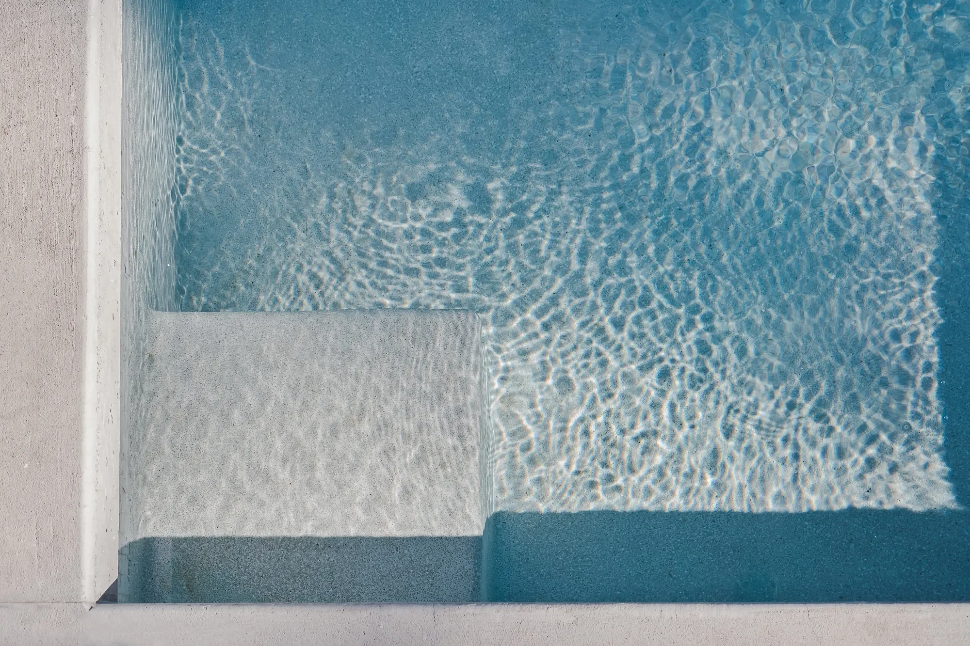 Swimming pool detail next to tiny house