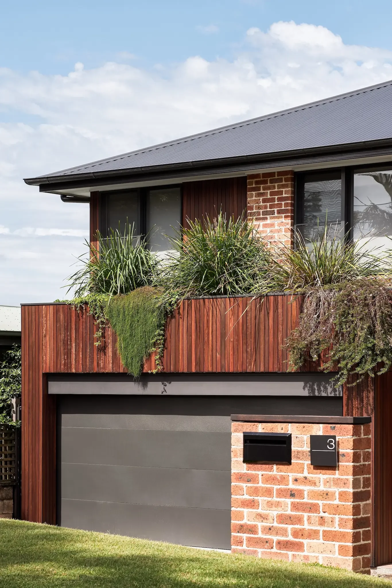 Brick facade renovation with timber screening in Sutherland Shire