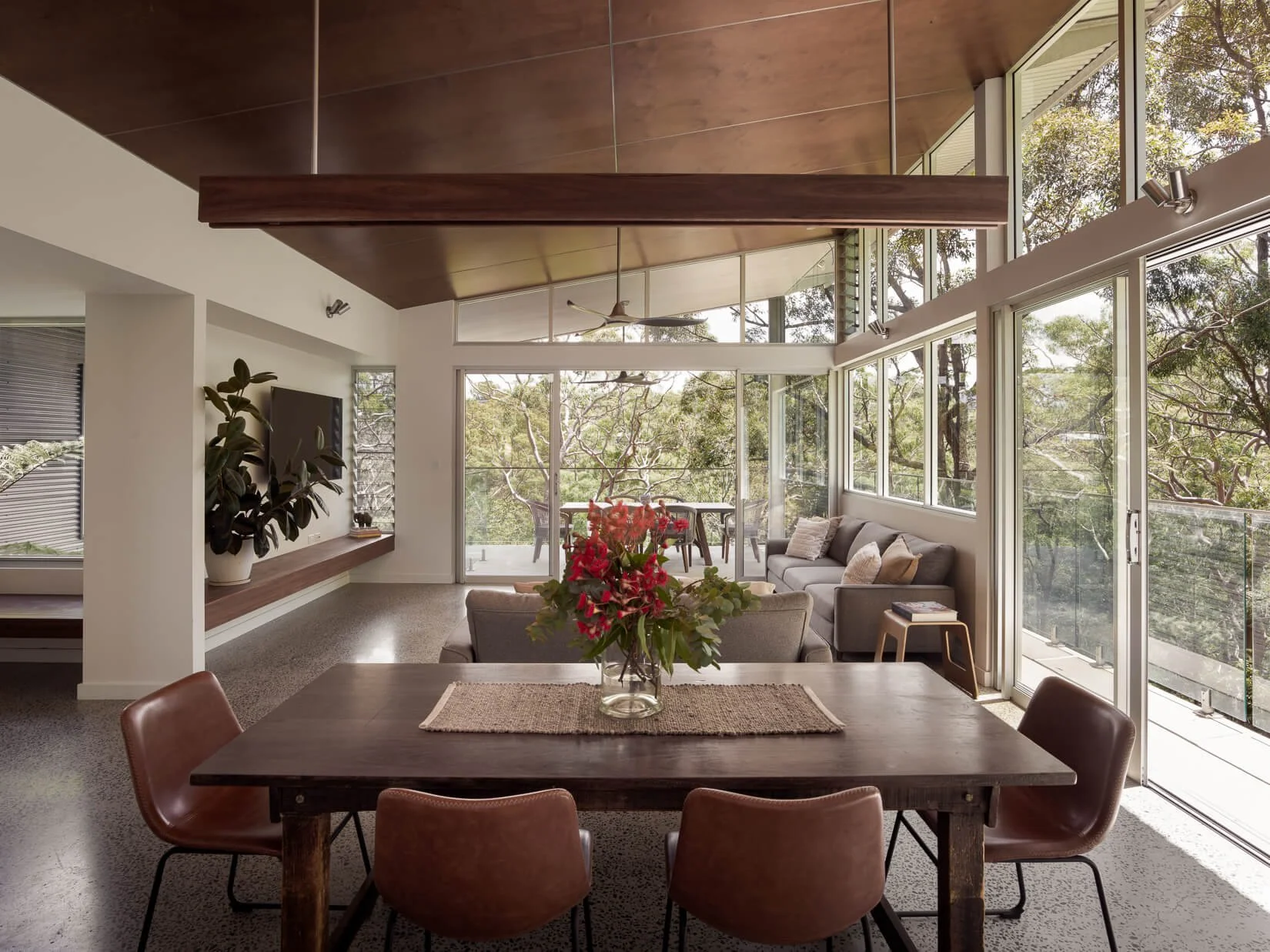 Dining area connected to garden in Northern Beaches home