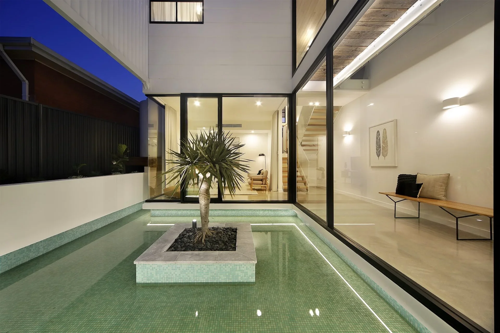 Swimming pool integrated into dual occupancy home design