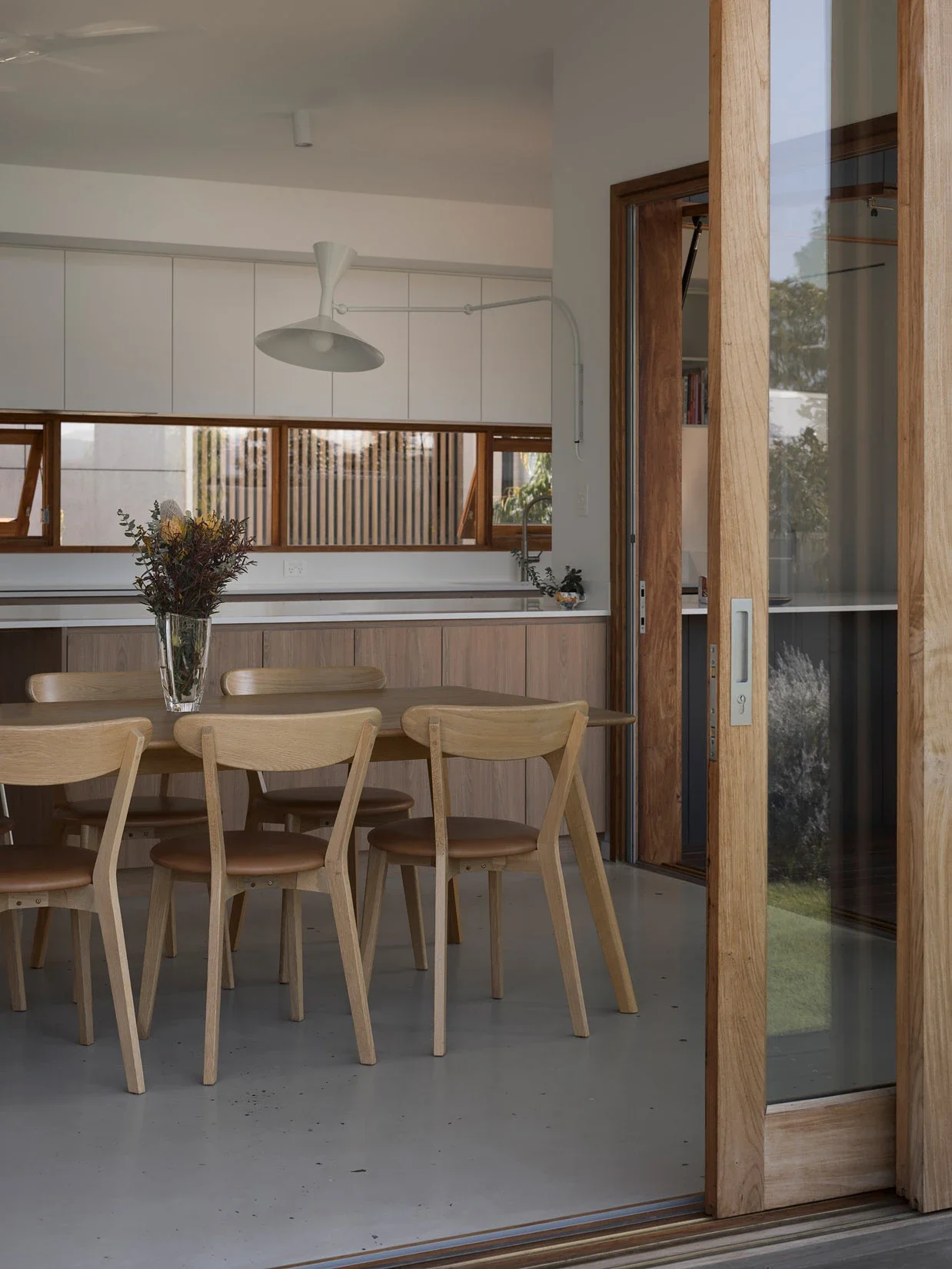 Dining space with natural light in Curl Curl home