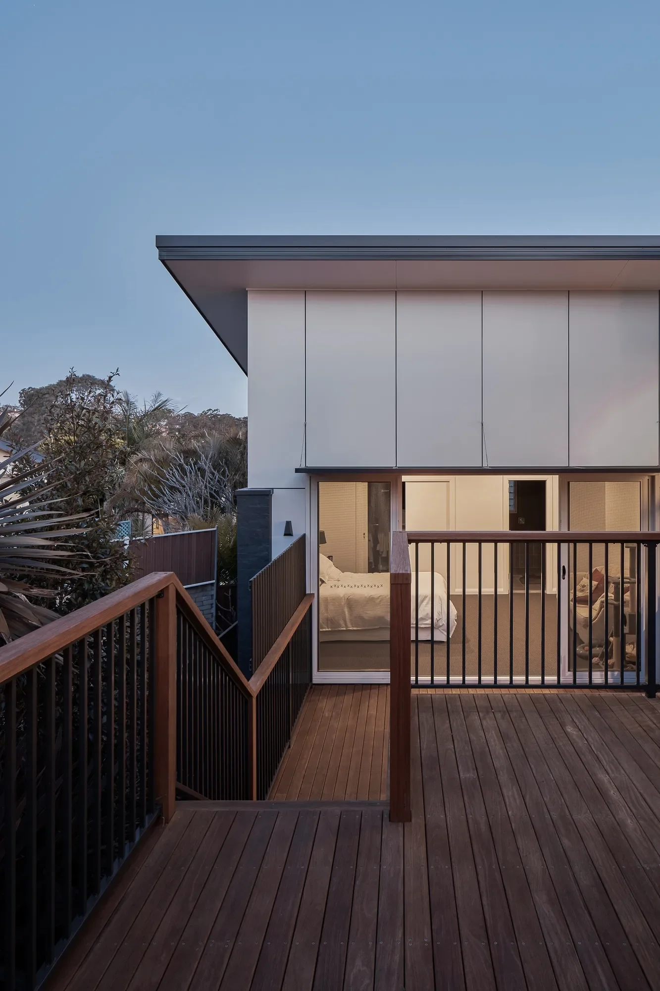 Elevated deck overlooking sloping site home