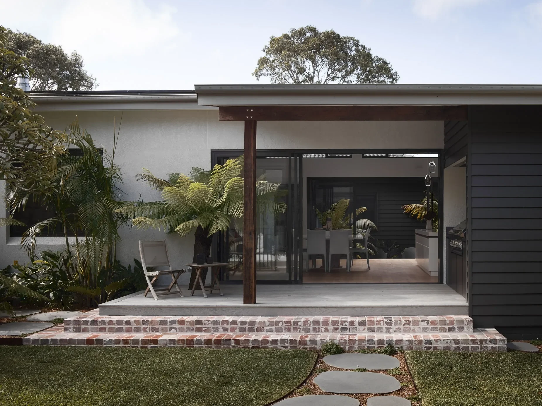 Outdoor terrace in modern home extension