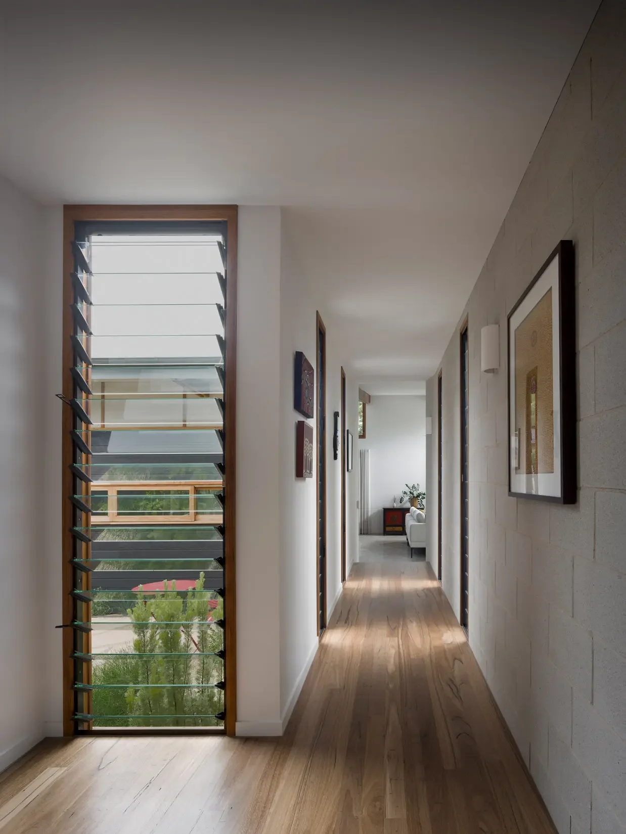 Hallway with natural light and passive design at Beela House